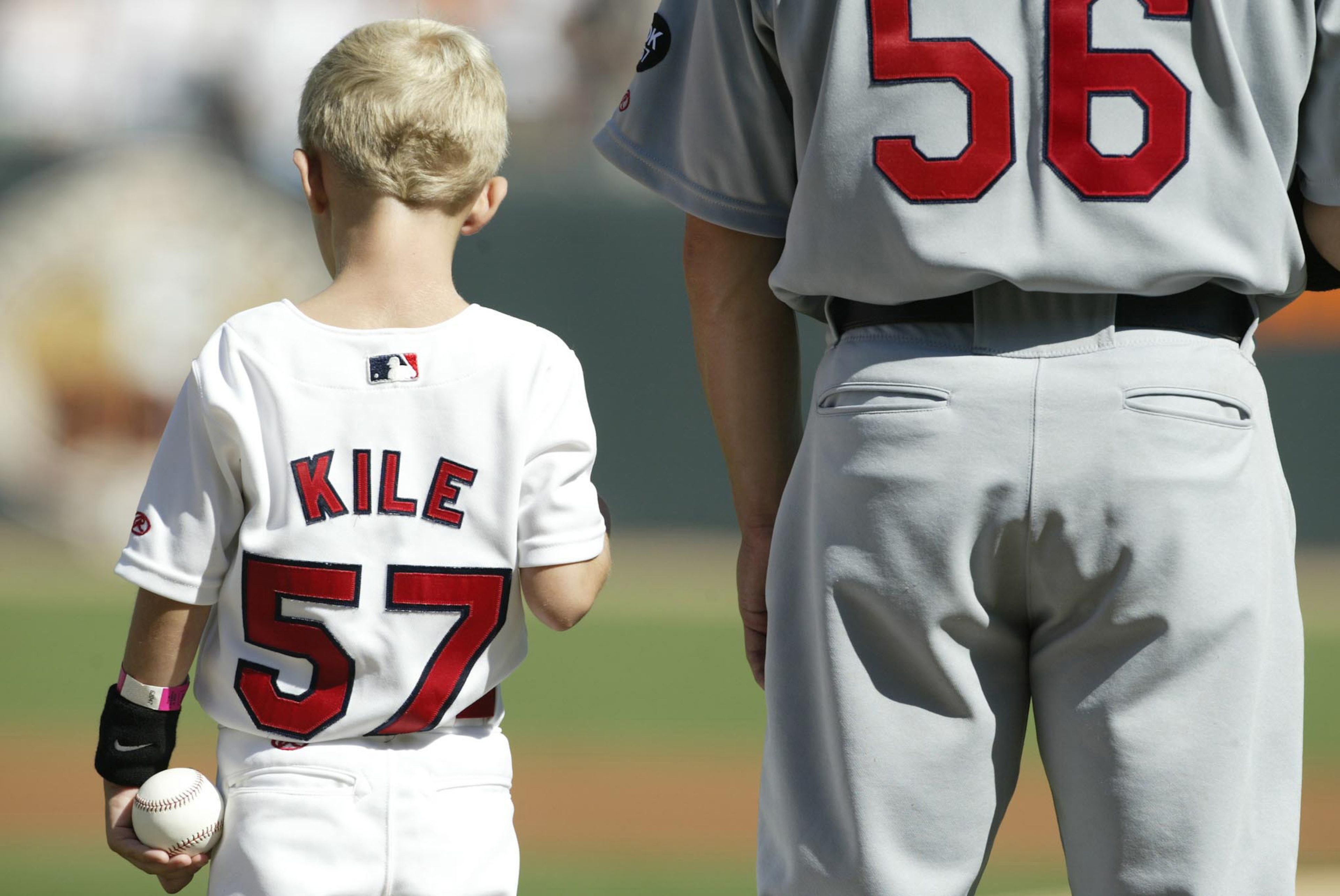 SAN FRANCISCO - OCTOBER 12: Kannon Kile, son of the late Darryl Kile of the St. Louis Cardinals stands during the National Anthem before the start of game three against the San Francisco Giants in the National League Champiobship series on October 12, 200