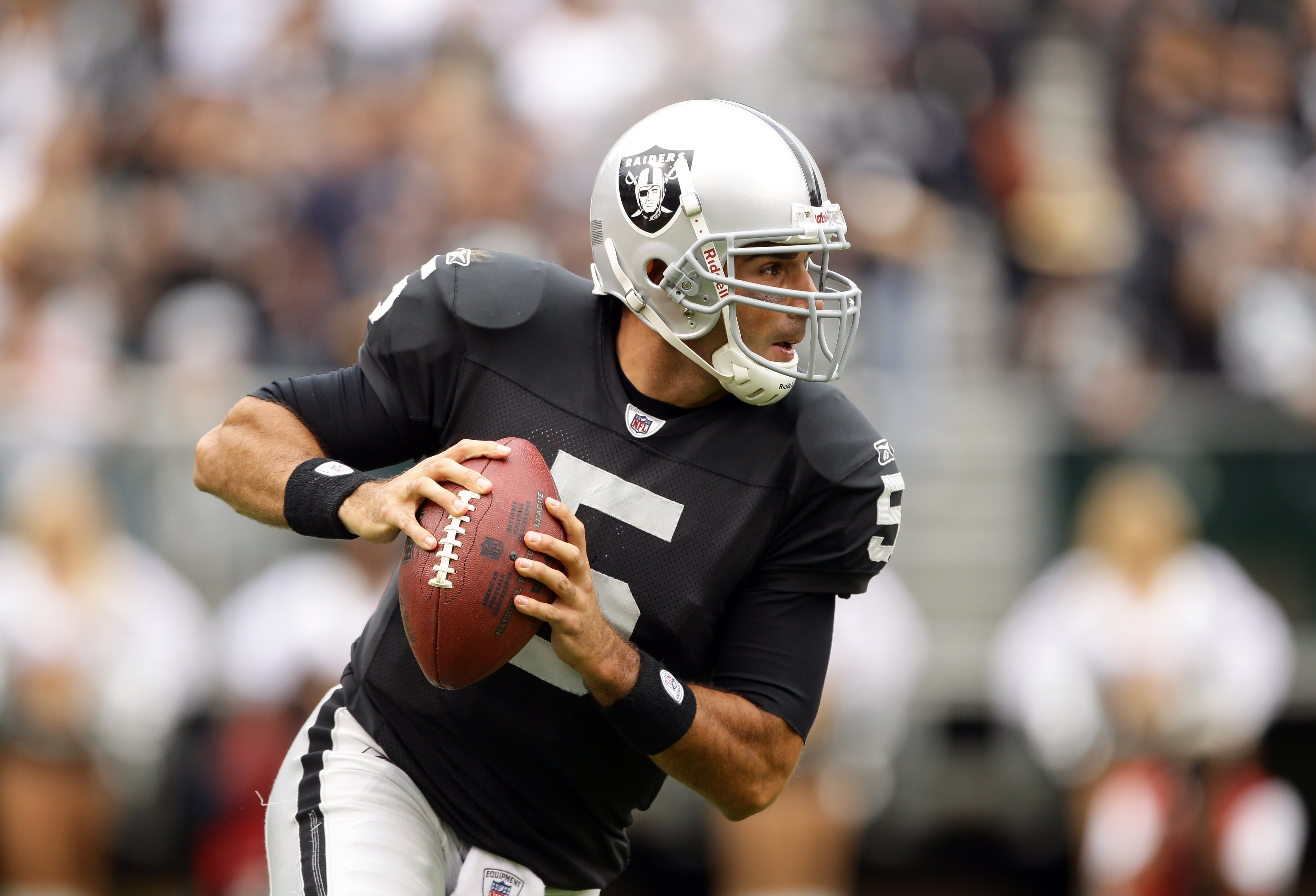 OAKLAND, CA - SEPTEMBER 19:  Bruce Gradkowski #5 of the Oakland Raiders in action against the St. Louis Rams at the Oakland-Alameda County Coliseum on September 19, 2010 in Oakland, California.  (Photo by Ezra Shaw/Getty Images)