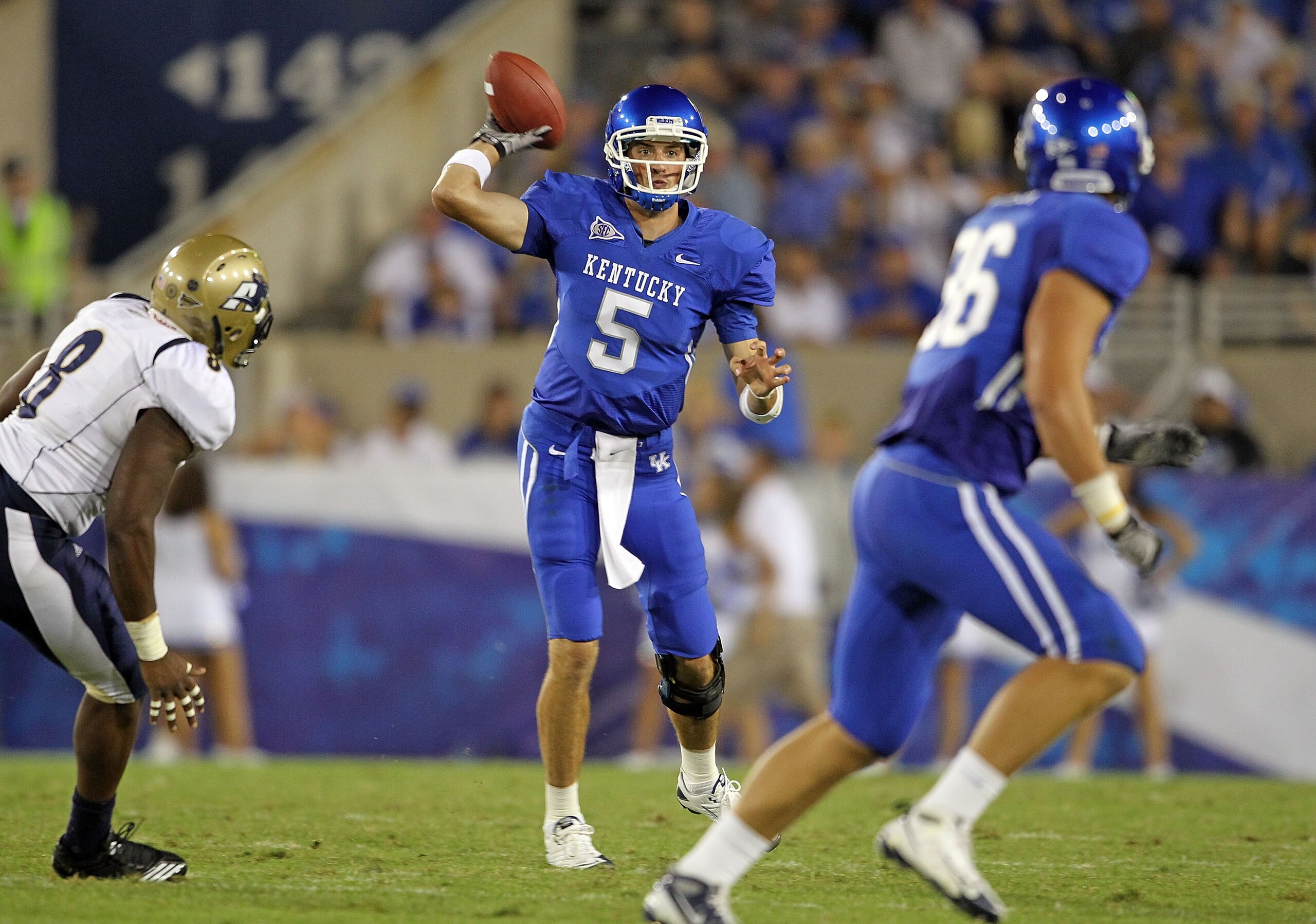 LEXINGTON, KY - SEPTEMBER 18:  Mike Hartline #5 of the Kentucky Wildcats throws a pass during the game against the Akron Zips at Commonwealth Stadium on September 18, 2010 in Lexington, Kentucky.  (Photo by Andy Lyons/Getty Images)
