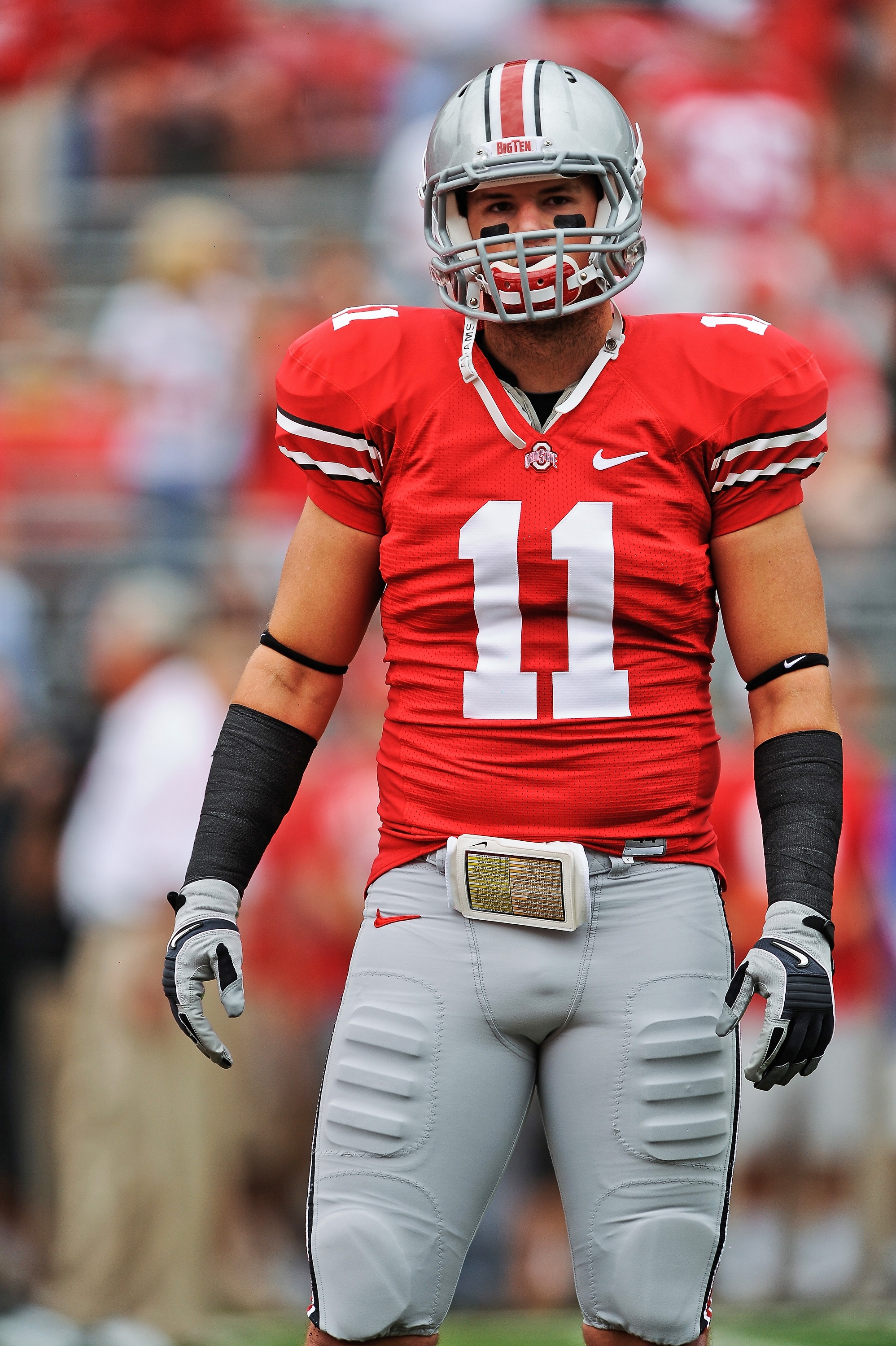 COLUMBUS, OH - SEPTEMBER 11:  Jake Stoneburner #11 of the Ohio State Buckeyes warms up before a game against the Miami Hurricanes at Ohio Stadium on September 11, 2010 in Columbus, Ohio.  (Photo by Jamie Sabau/Getty Images)