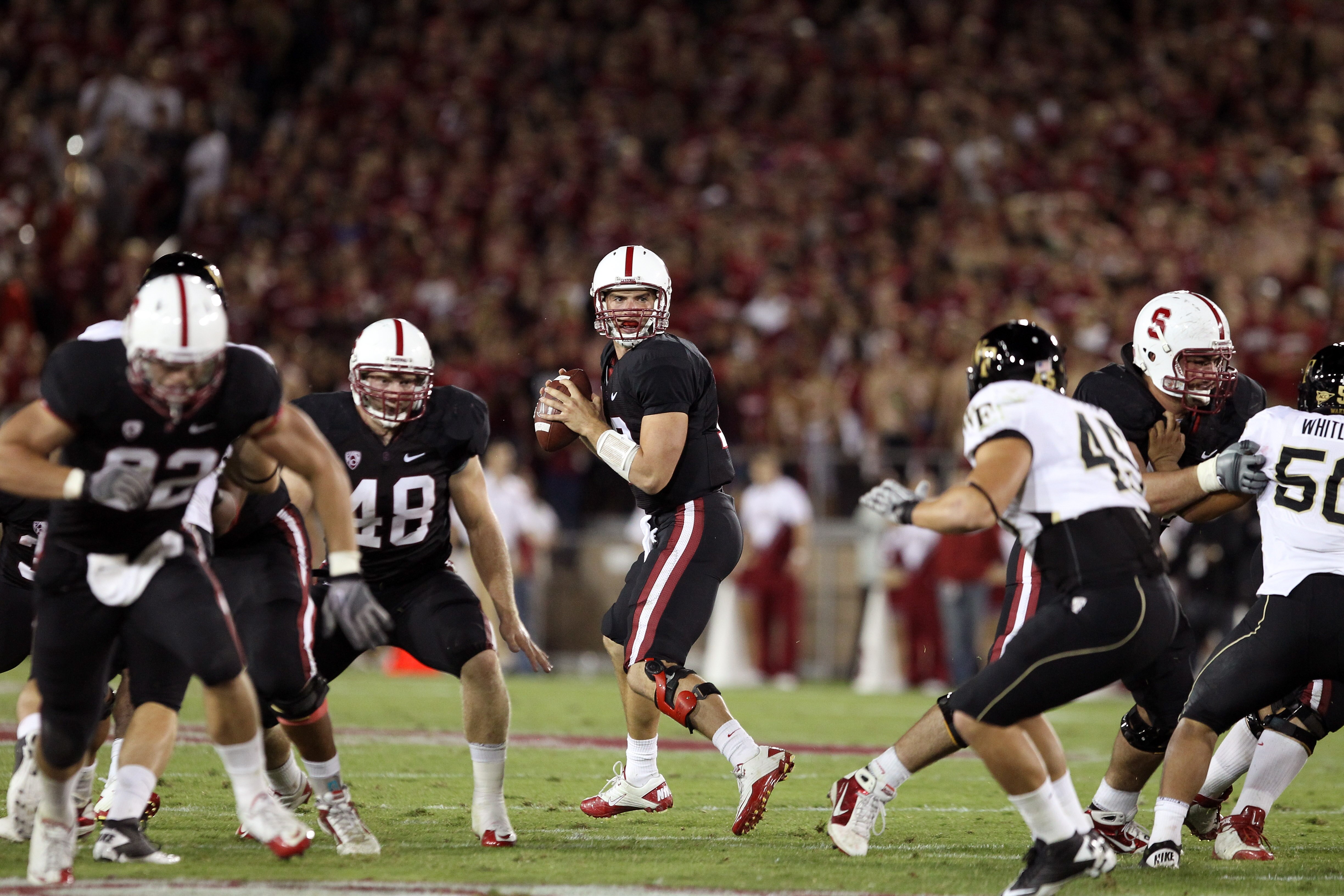 PALO ALTO, CA - SEPTEMBER 18:  Andrew Luck #12 of the Stanford Cardinal in action against the Wake Forest Demon Deacons at Stanford Stadium on September 18, 2010 in Palo Alto, California.  (Photo by Ezra Shaw/Getty Images)