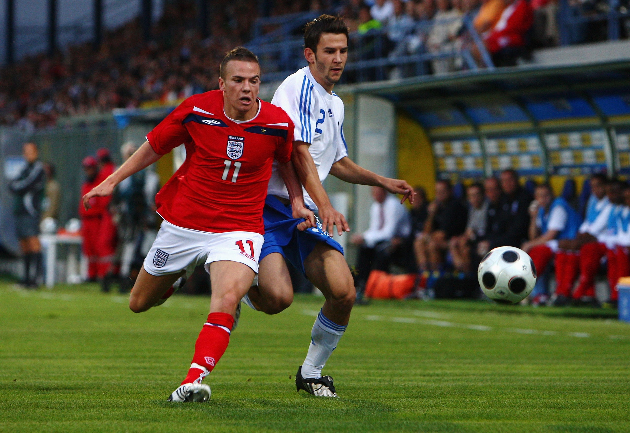 TRIPOLIS, GREECE - SEPTEMBER 08:  Tom Cleverley of England battles with Leonidas Argyropoulos of Greece during the UEFA U21 Championship match between Greece and England at the Asteras Tripolis Stadium on September 8, 2009 in Tripolis, Greece.  (Photo by