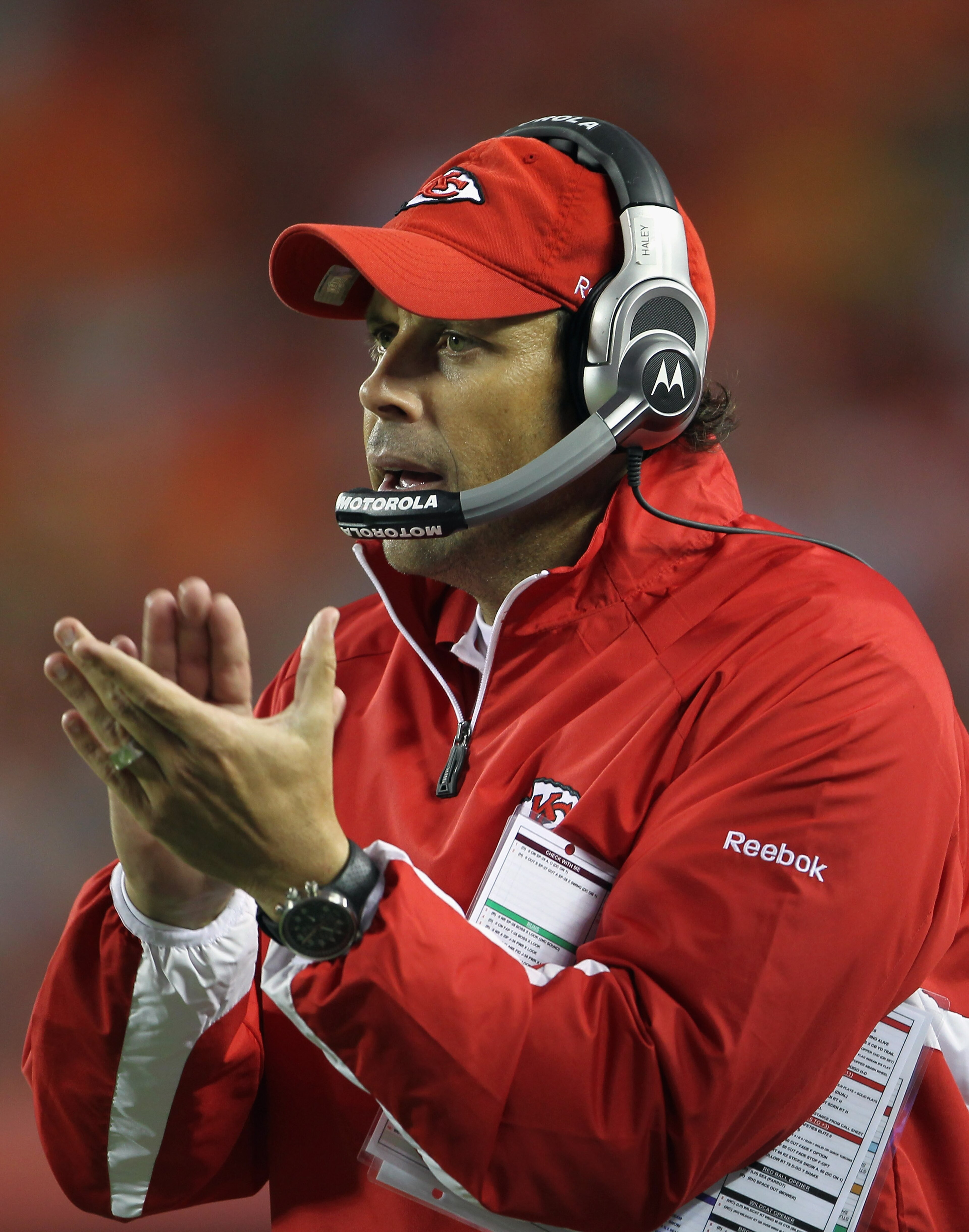 KANSAS CITY, MO - SEPTEMBER 02:  Head coach Todd Haley of the Kansas City Chiefs applaudes players from the sidelines during the game against the Green Bay Packers on September 2, 2010 at Arrowhead Stadium in Kansas City, Missouri.  (Photo by Jamie Squire