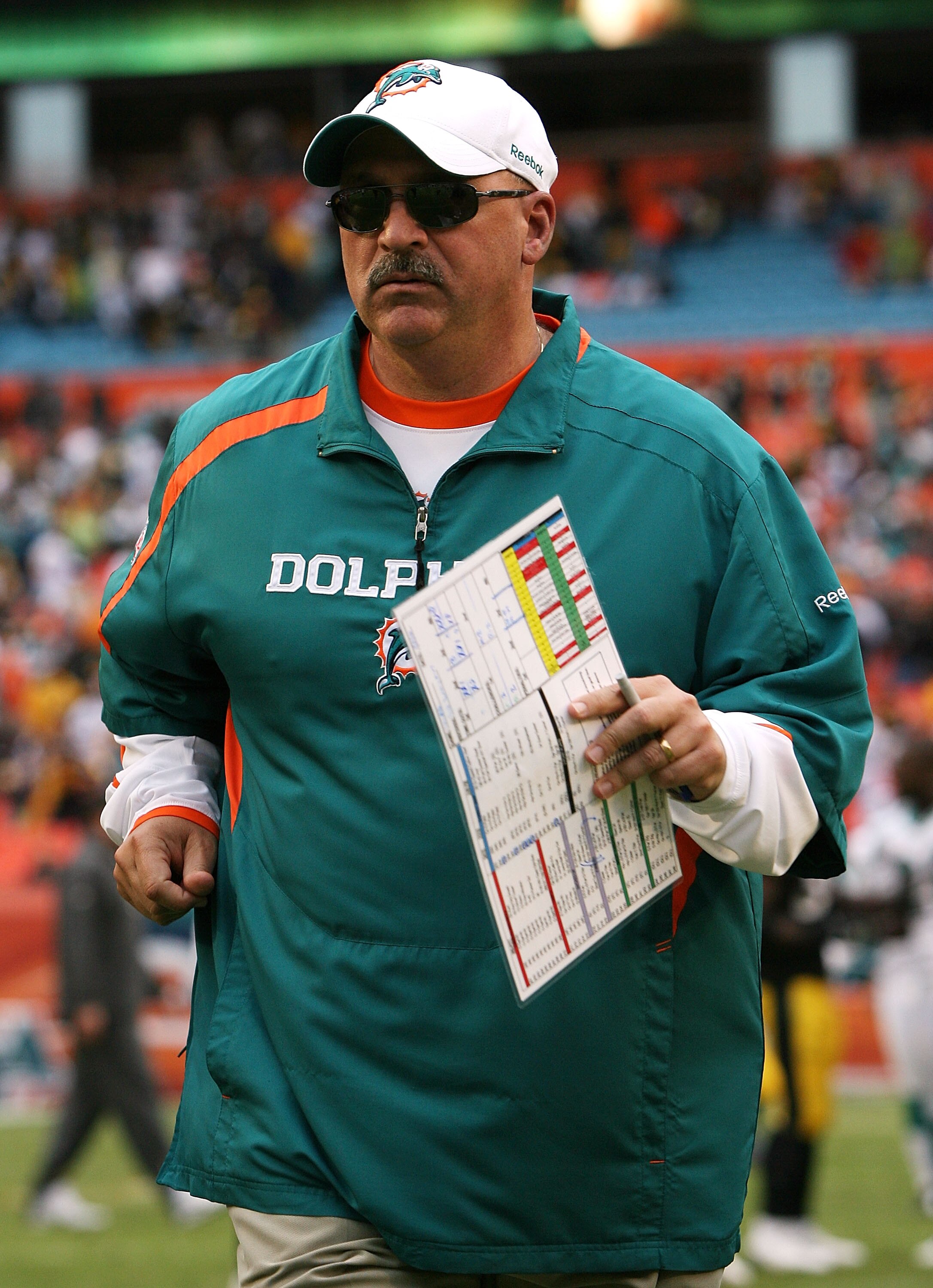 MIAMI - JANUARY 03:  Head coach Tony Sparano of the Miami Dolphins runs off the field after being defeated by the Pittsburgh Steelers at Land Shark Stadium on January 3, 2010 in Miami, Florida. The Steelers defeated the Dolphins 30-24.  (Photo by Doug Ben