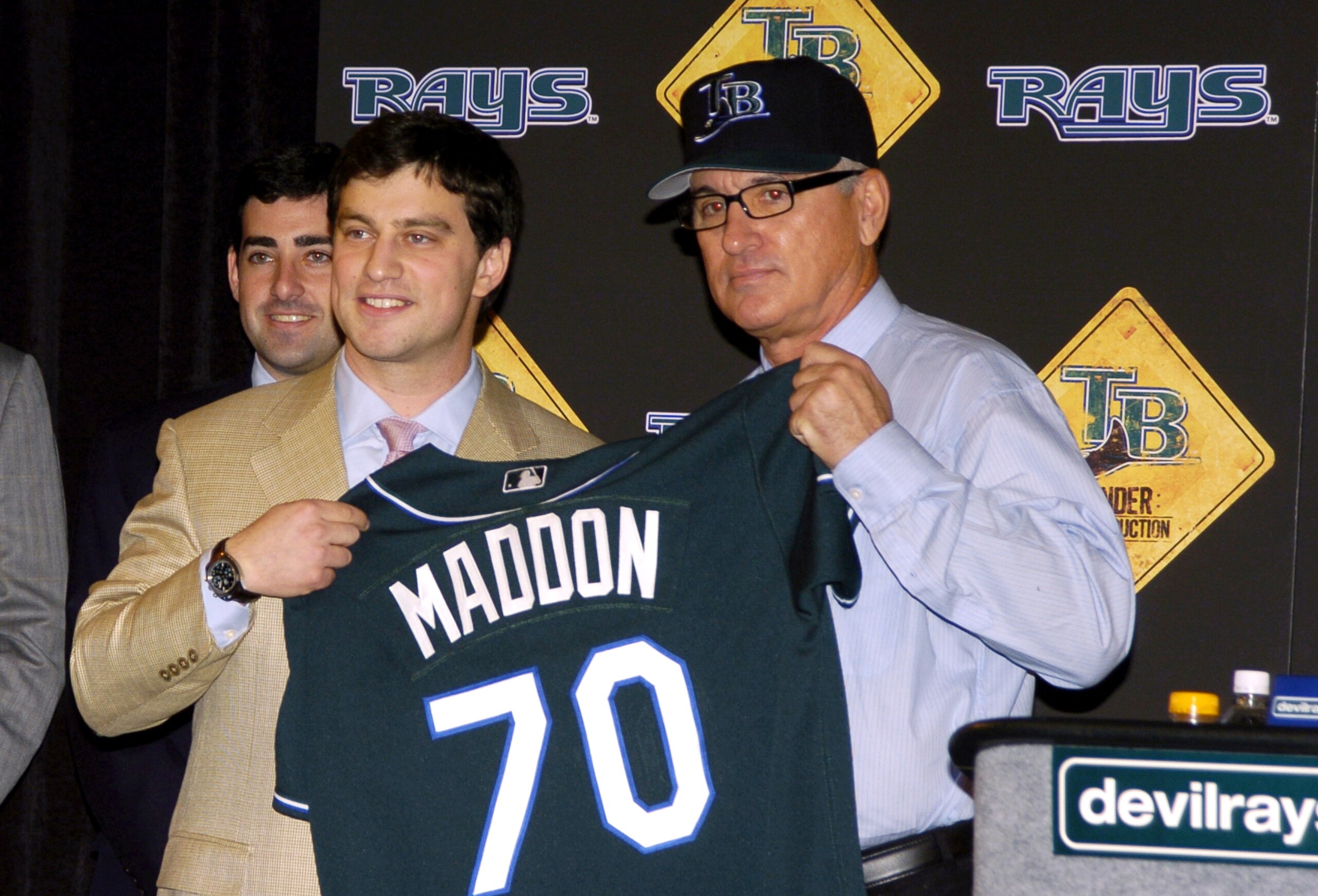 Tampa Bay Devil Rays executive vice-president of baseball operations Andrew Friedman introduces new manager Joe Maddon at a press conference November 15, 2005 in St. Petersburg. (Photo by A. Messerschmidt/Getty Images) *** Local Caption ***