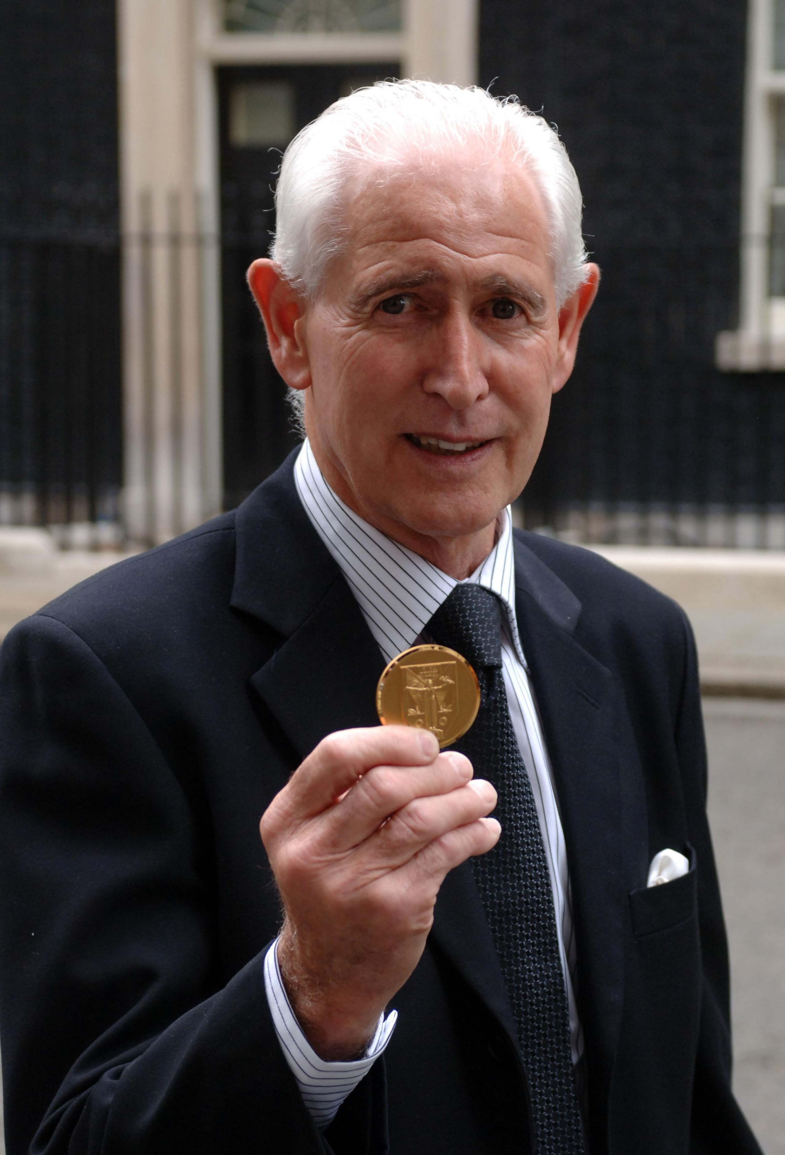 LONDON, UNITED KINGDOM - JUNE 10:  Goal keeper Peter Bonetti shows the medal presented by Prime Minister Gordon Brown for representing his country in the 1966 World Cupa at Downing Street on June 10, 2009 in London England. When England lifted the World C