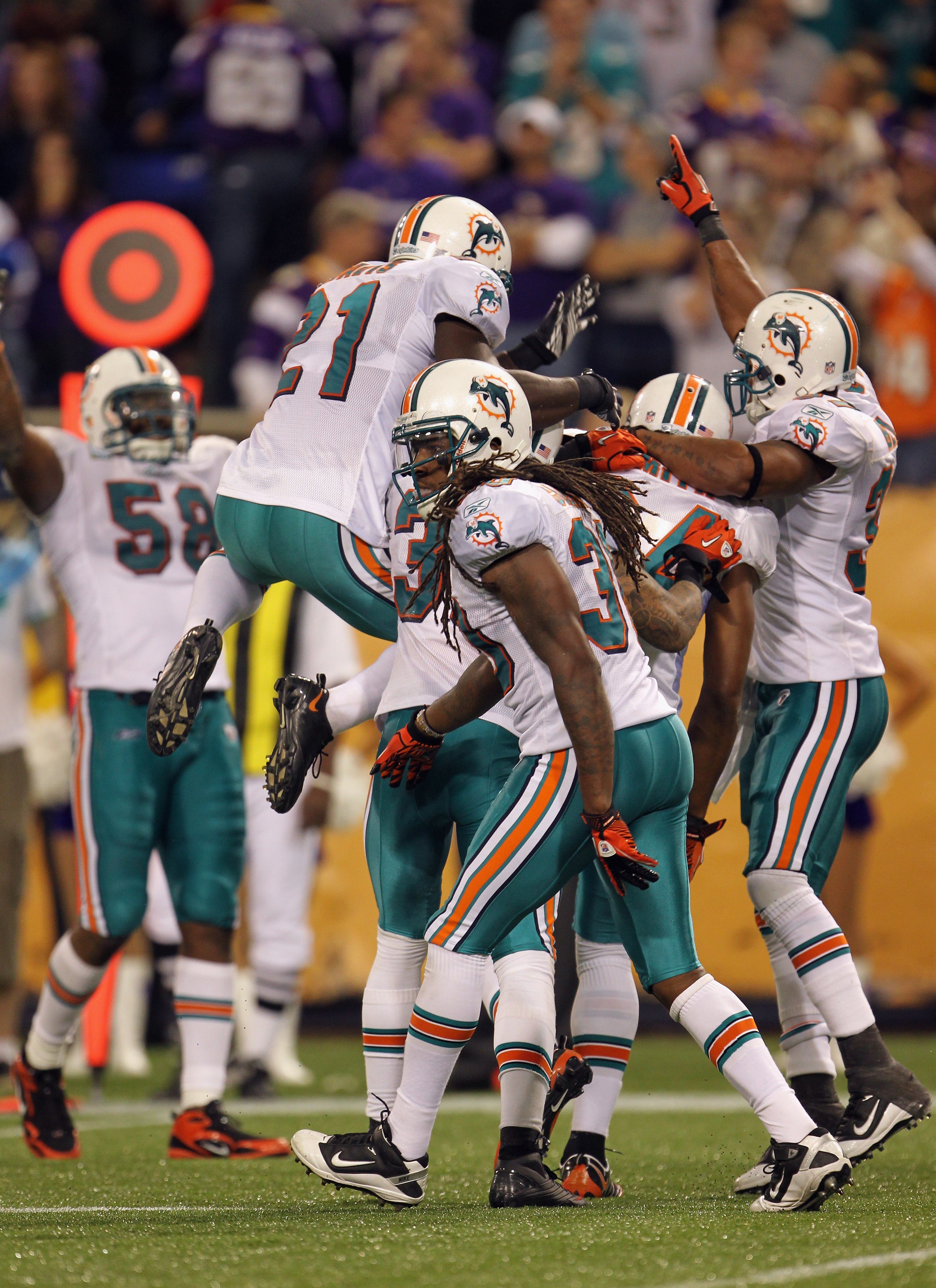 MINNEAPOLIS - SEPTEMBER 19:  The Miami Dolphins defense celebrates after stopping a drive by the Minnesota Vikings late in the 4th quarter during the game on September 19, 2010 at Hubert H. Humphrey Metrodome in Minneapolis, Minnesota.  (Photo by Jamie Sq