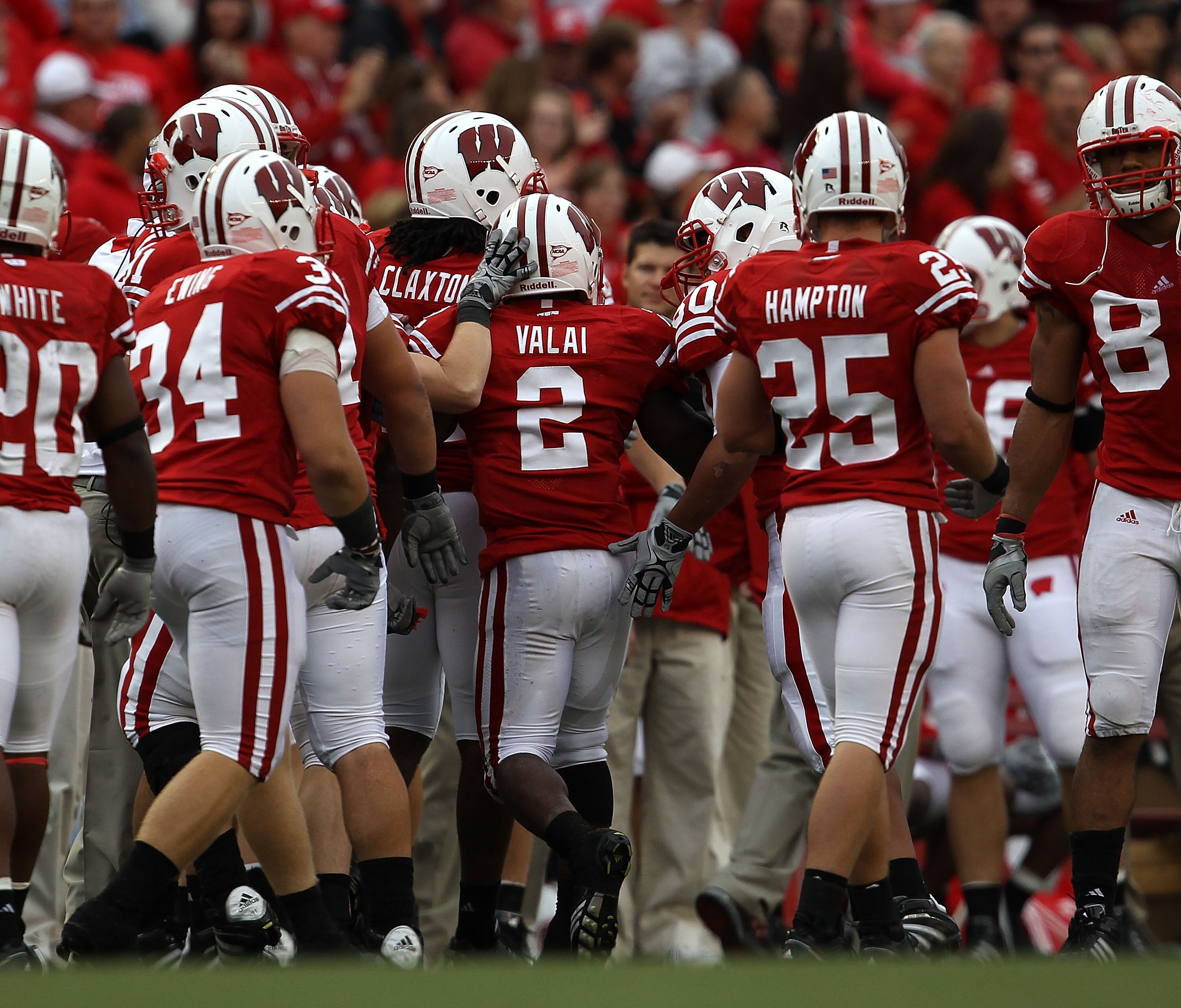 MADISON, WI - SEPTEMBER 18: Jay Valai #2 of the Wisconsin Badgers is congratulated by teammates after blocking an extra point attempt by the Arizona State Sun Devils at Camp Randall Stadium on September 18, 2010 in Madison, Wisconsin. Wisconsin defeated A
