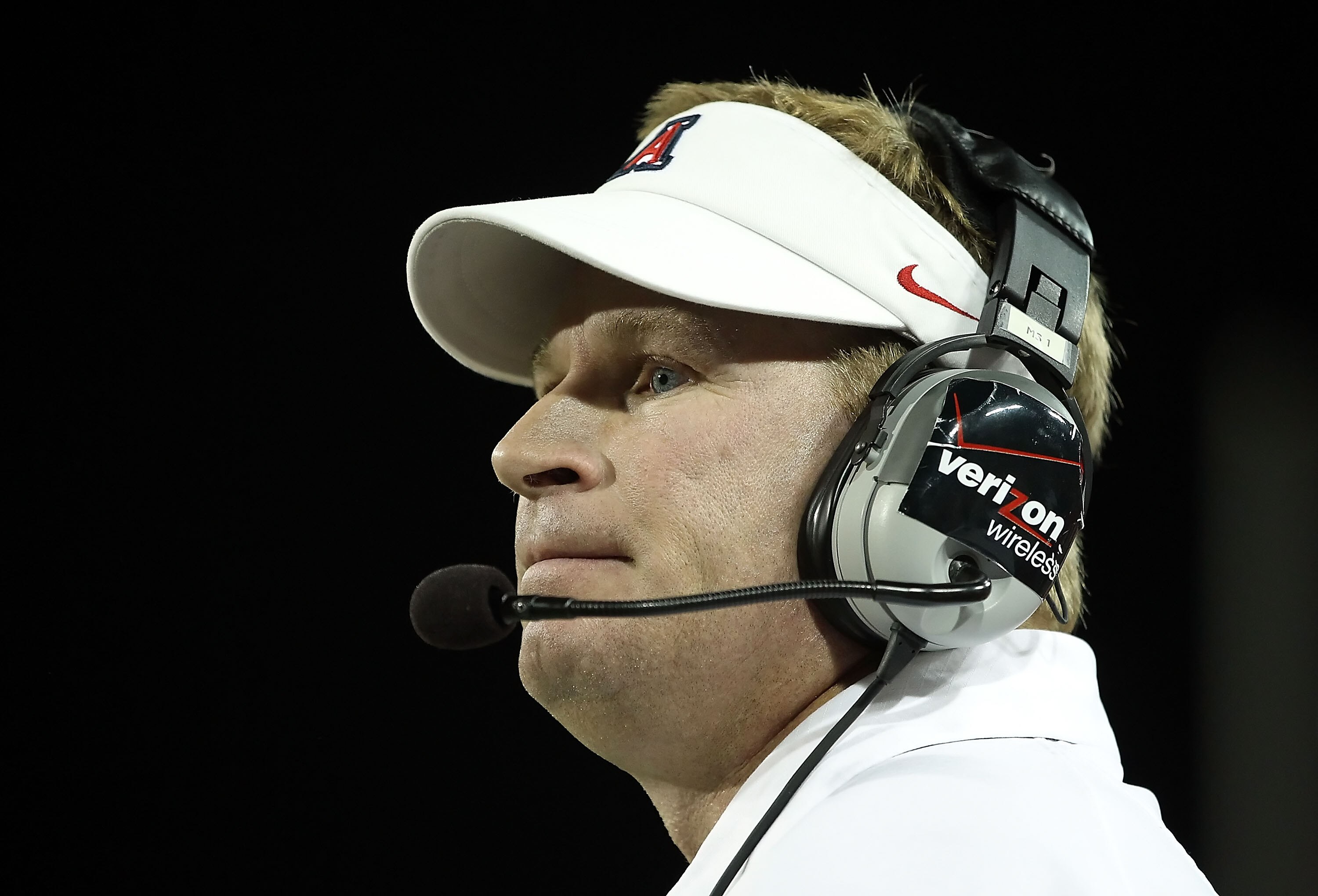 TUCSON, AZ - SEPTEMBER 18:  Head coach Mike Stoops of the Arizona Wildcats watches from the sidelines during the college football game against the Iowa Hawkeyes at Arizona Stadium on September 18, 2010 in Tucson, Arizona. The Wildcats defeated the Hawkeye