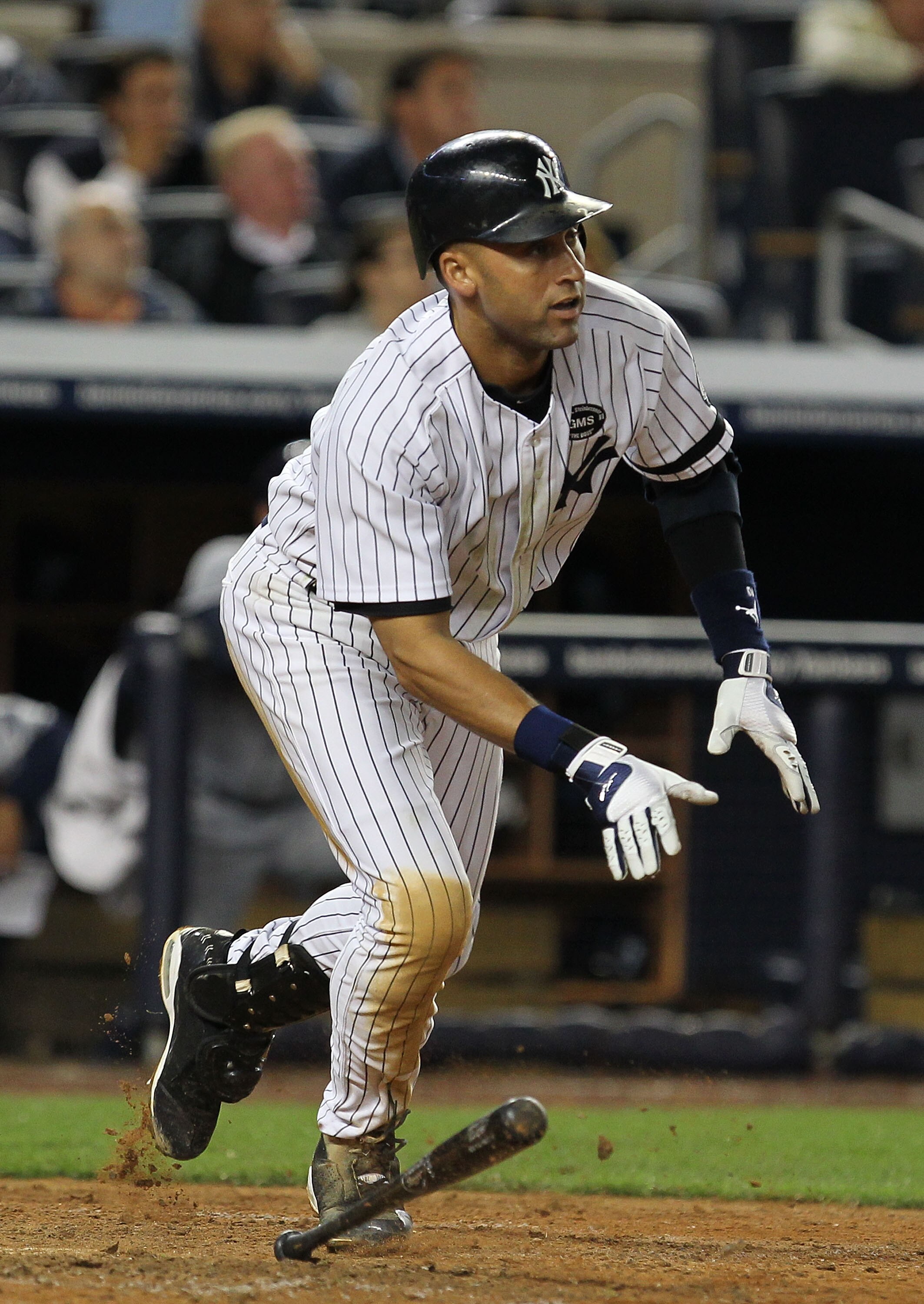NEW YORK - SEPTEMBER 21:  Derek Jeter #2 of the New York Yankees drives in a run with a hit in the eigth inning against  the Tampa Bay Rays during their game on September 21, 2010 at Yankee Stadium in the Bronx borough of New York City.  (Photo by Al Bell