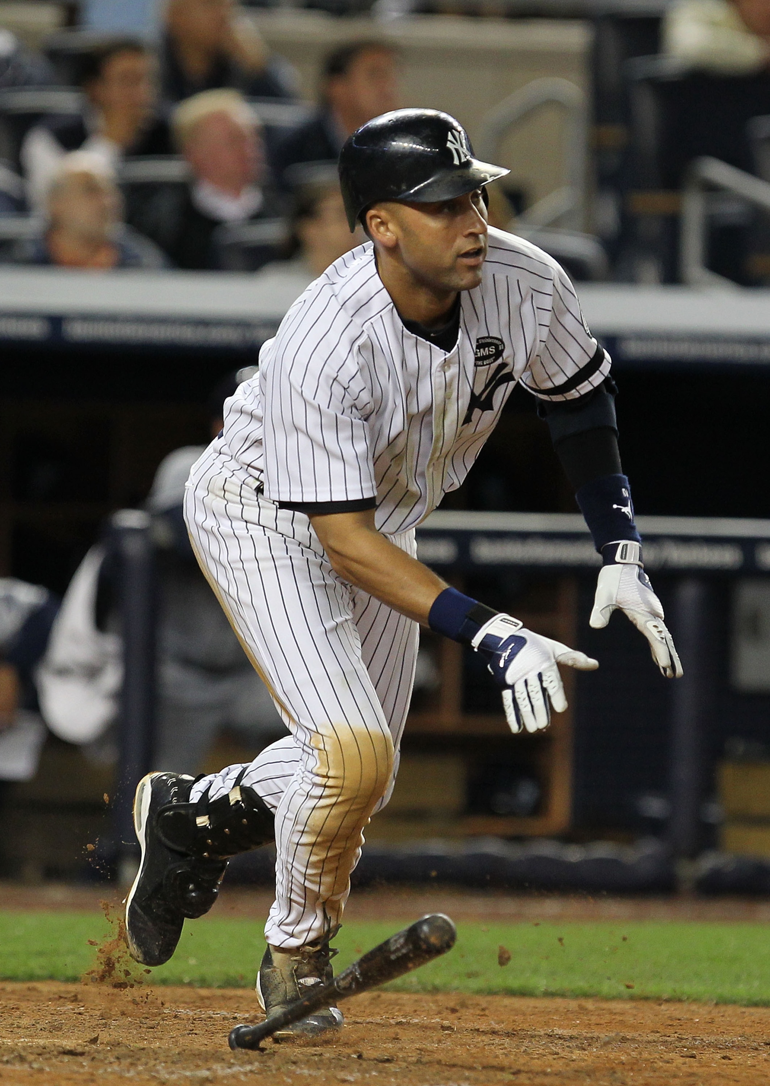 NEW YORK - SEPTEMBER 21:  Derek Jeter #2 of the New York Yankees drives in a run with a hit in the eigth inning against  the Tampa Bay Rays during their game on September 21, 2010 at Yankee Stadium in the Bronx borough of New York City.  (Photo by Al Bell