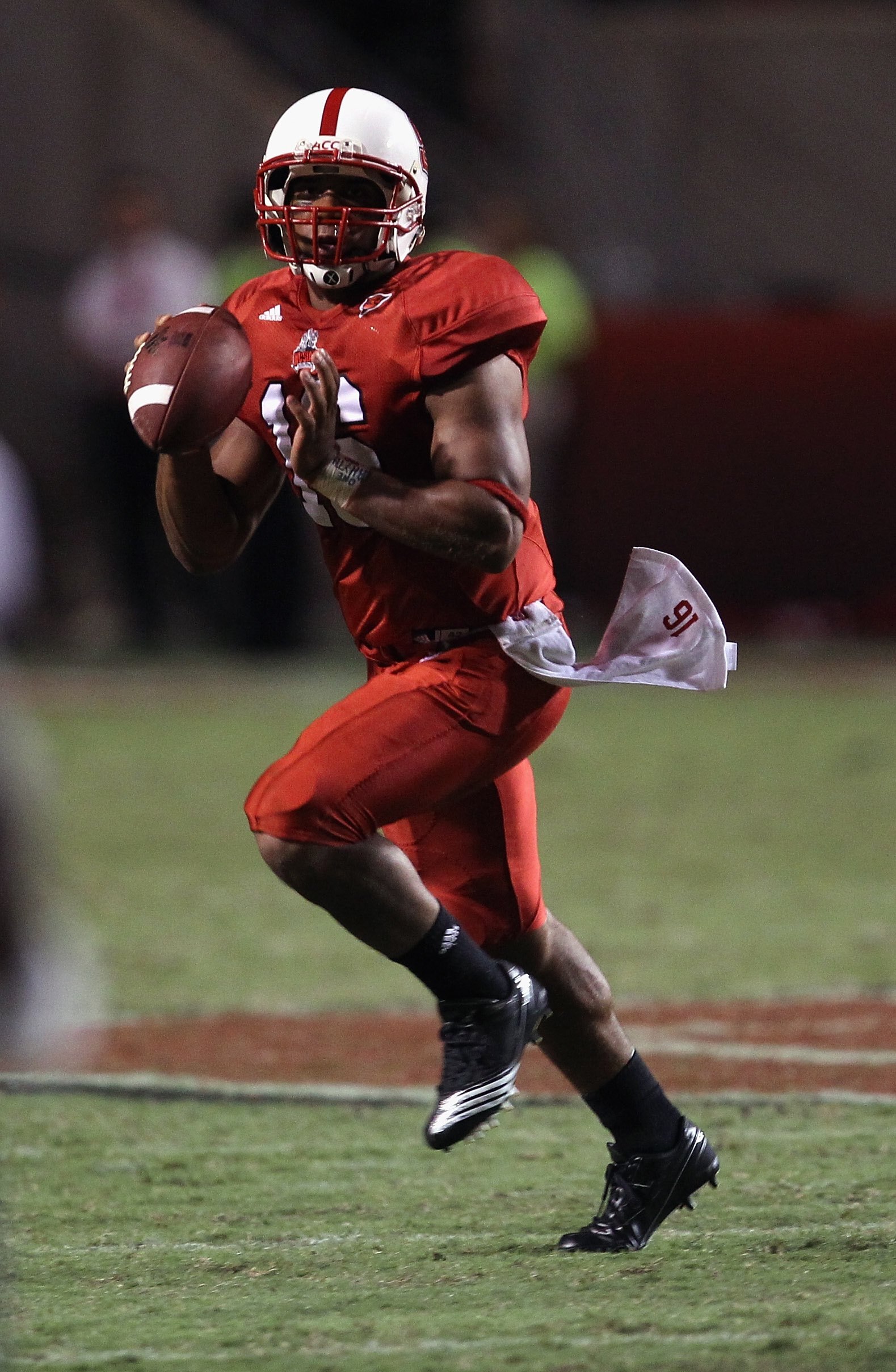 RALEIGH, NC - SEPTEMBER 16: Russell Wilson #16 of the North Carolina State Wolfpack runs with the ball against the Cincinnati Bearcats during their game at Carter-Finley Stadium on September 16, 2010 in Raleigh, North Carolina. (Photo by Streeter Lecka/ RALEIGH, NC - SEPTEMBER 16: Russell Wilson #16 of the North Carolina State Wolfpack runs with the ball against the Cincinnati Bearcats during their game at Carter-Finley Stadium on September 16, 2010 in Raleigh, North Carolina. (Photo by Streeter Lecka/