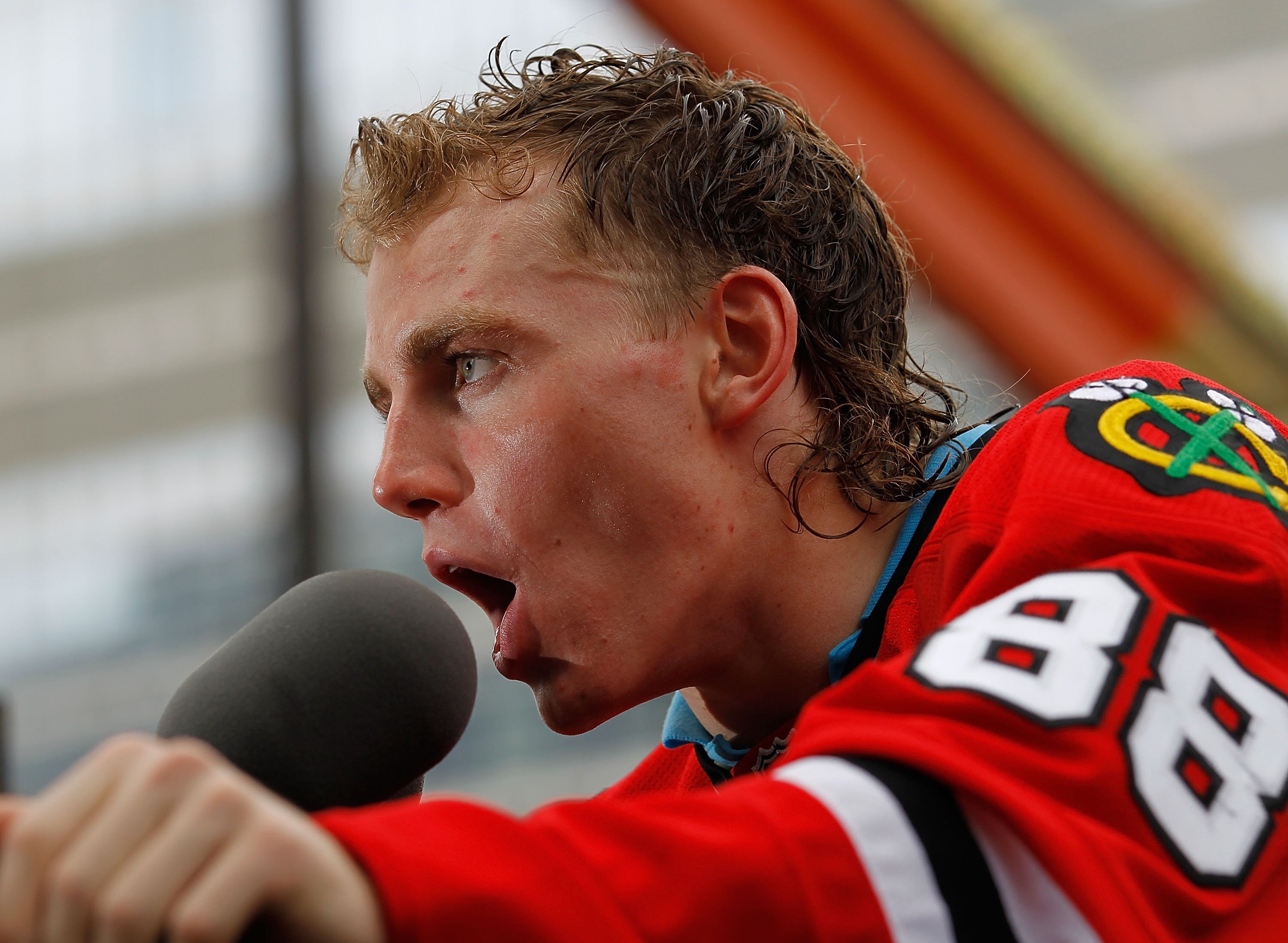 CHICAGO - JUNE 11: Patrick Kane #88 speaks to the crowd during the Chicago Blackhawks Stanley Cup victory parade and rally on June 11, 2010 in Chicago, Illinois. (Photo by Jonathan Daniel/Getty Images)