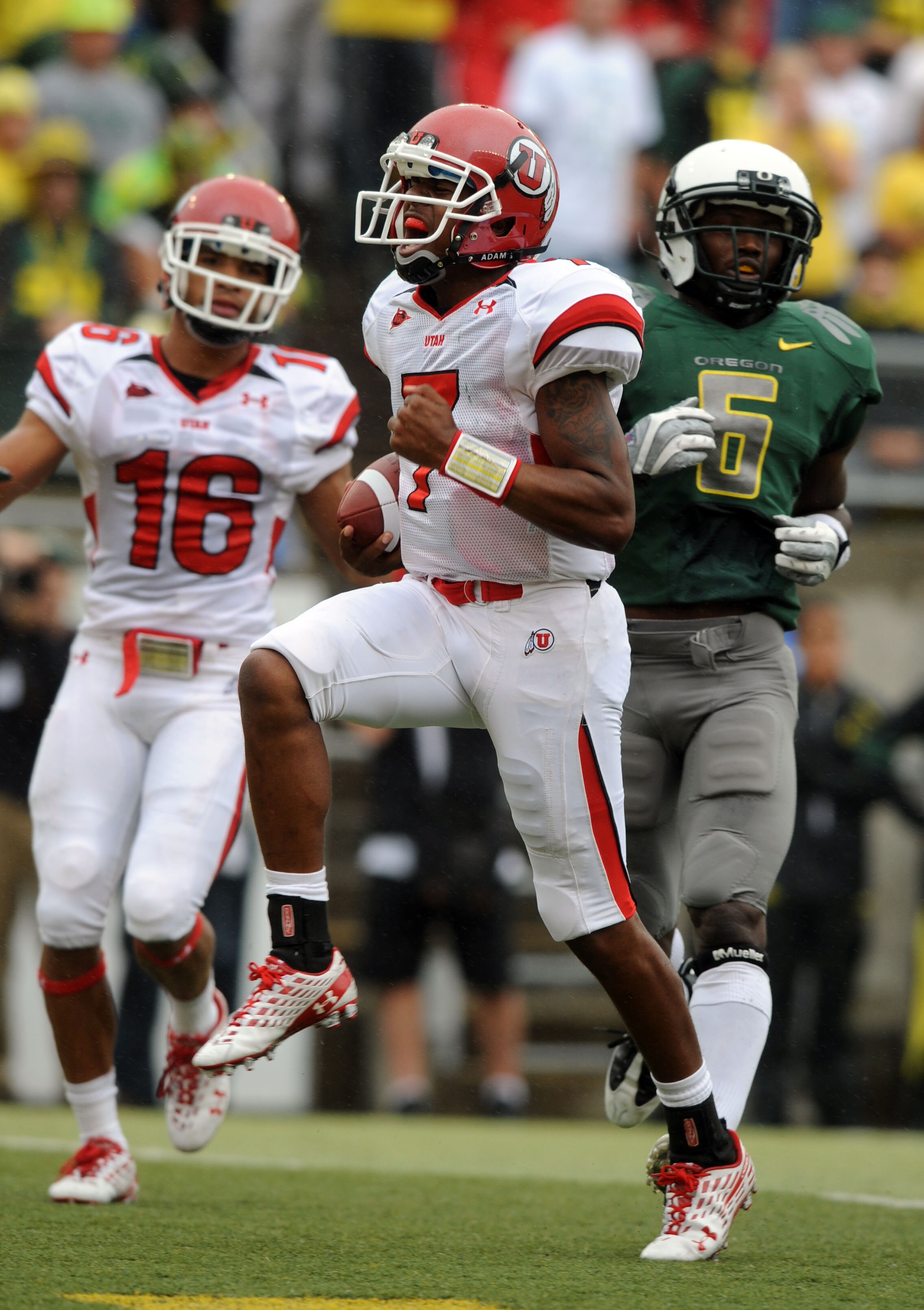 EUGENE, OR - SEPTEMBER 19: Quarterback Terrance Cain #7 of the Utah Utes celebrates his touchdown run in the first quarter of the game against the Oregon Ducks at Autzen Stadium on September 19, 2009 in Eugene, Oregon. (Photo by Steve Dykes/Getty Images)