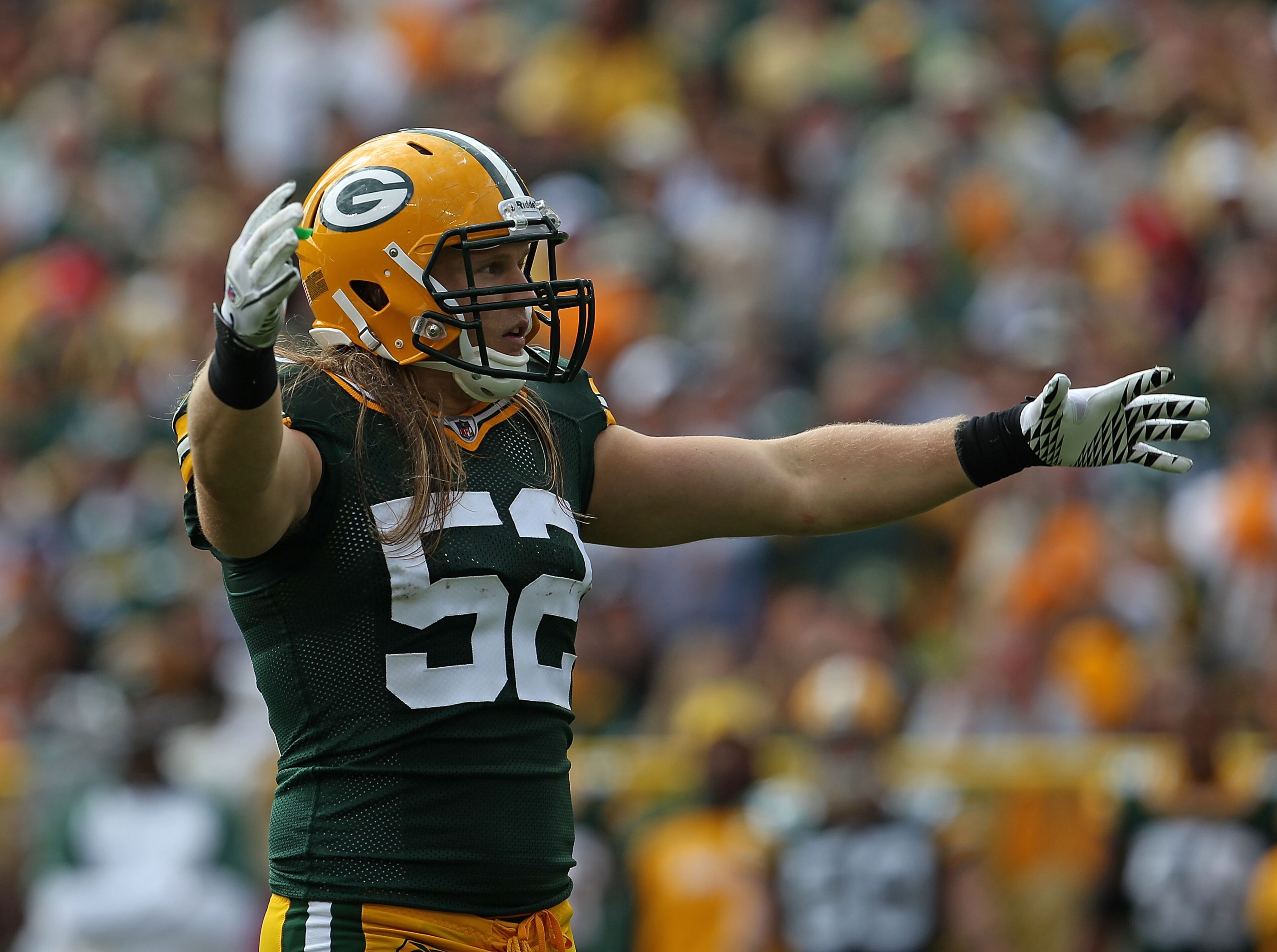 GREEN BAY, WI - SEPTEMBER 19: Clay Matthews #52 of the Green Bay Packers encourages the crowd during a game against the Buffalo Bills at Lambeau Field on September 19, 2010 in Green Bay, Wisconsin. The Packers defeated the Bills 34-7. (Photo by Jonathan GREEN BAY, WI - SEPTEMBER 19: Clay Matthews #52 of the Green Bay Packers encourages the crowd during a game against the Buffalo Bills at Lambeau Field on September 19, 2010 in Green Bay, Wisconsin. The Packers defeated the Bills 34-7. (Photo by Jonathan