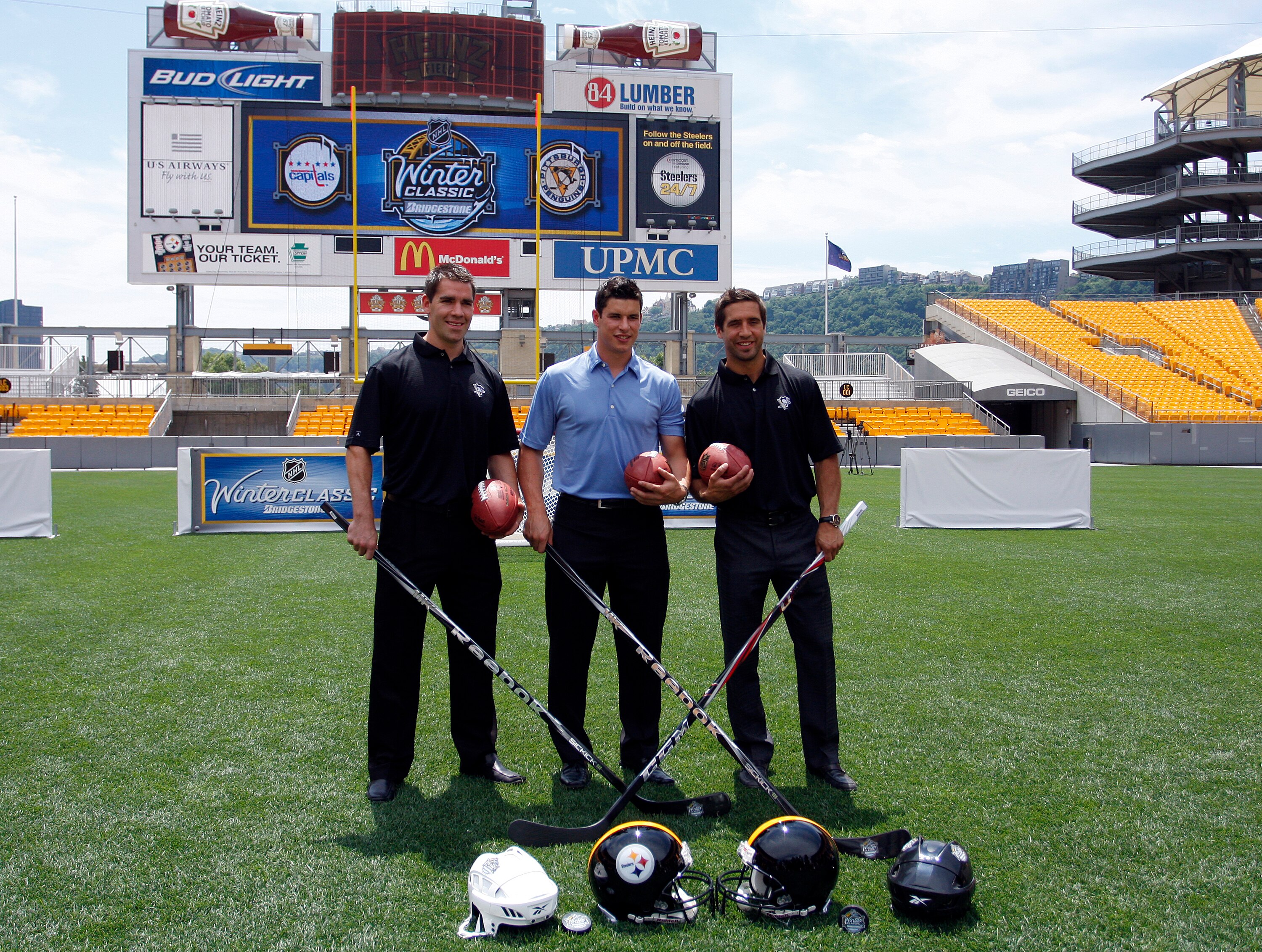 PITTSBURGH - JULY 27:  (L-R) Pascal Dupuis, Sidney Crosby and Maxime Talbot of the Pittsburgh Penguins pose for a photo at the 2011 Bridgestone NHL Winter Classic press conference on July 27, 2010 at Heinz Field in Pittsburgh, Pennsylvania.  (Photo by Jus