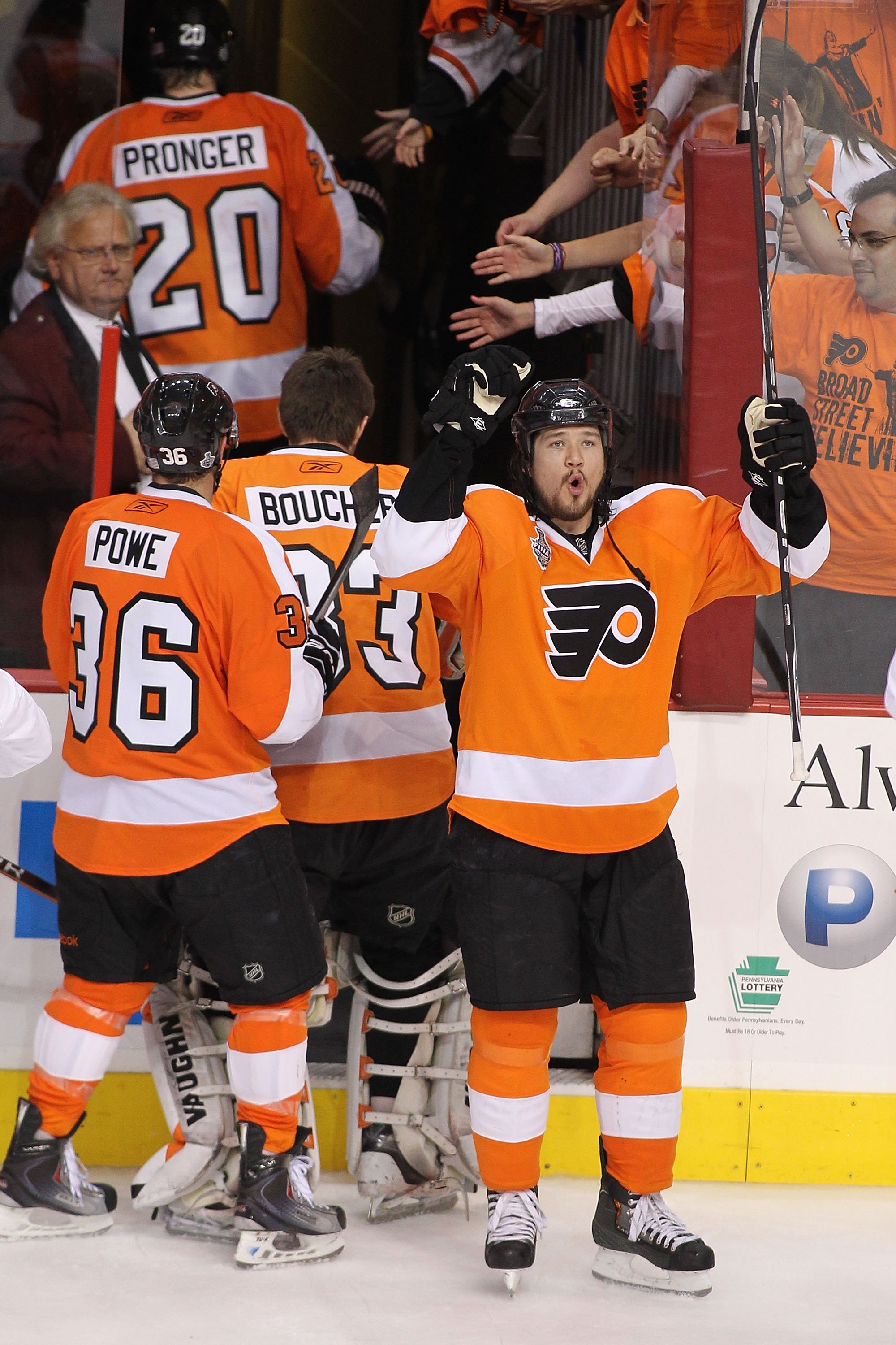 PHILADELPHIA - JUNE 02:  Arron Asham #45 of the Philadelphia Flyers celebrates after teammate Claude Giroux #28 scored the game-winning goal in overtime to defeat the Chicago Blackhawks 4-3 in Game Three of the 2010 NHL Stanley Cup Final at Wachovia Cente