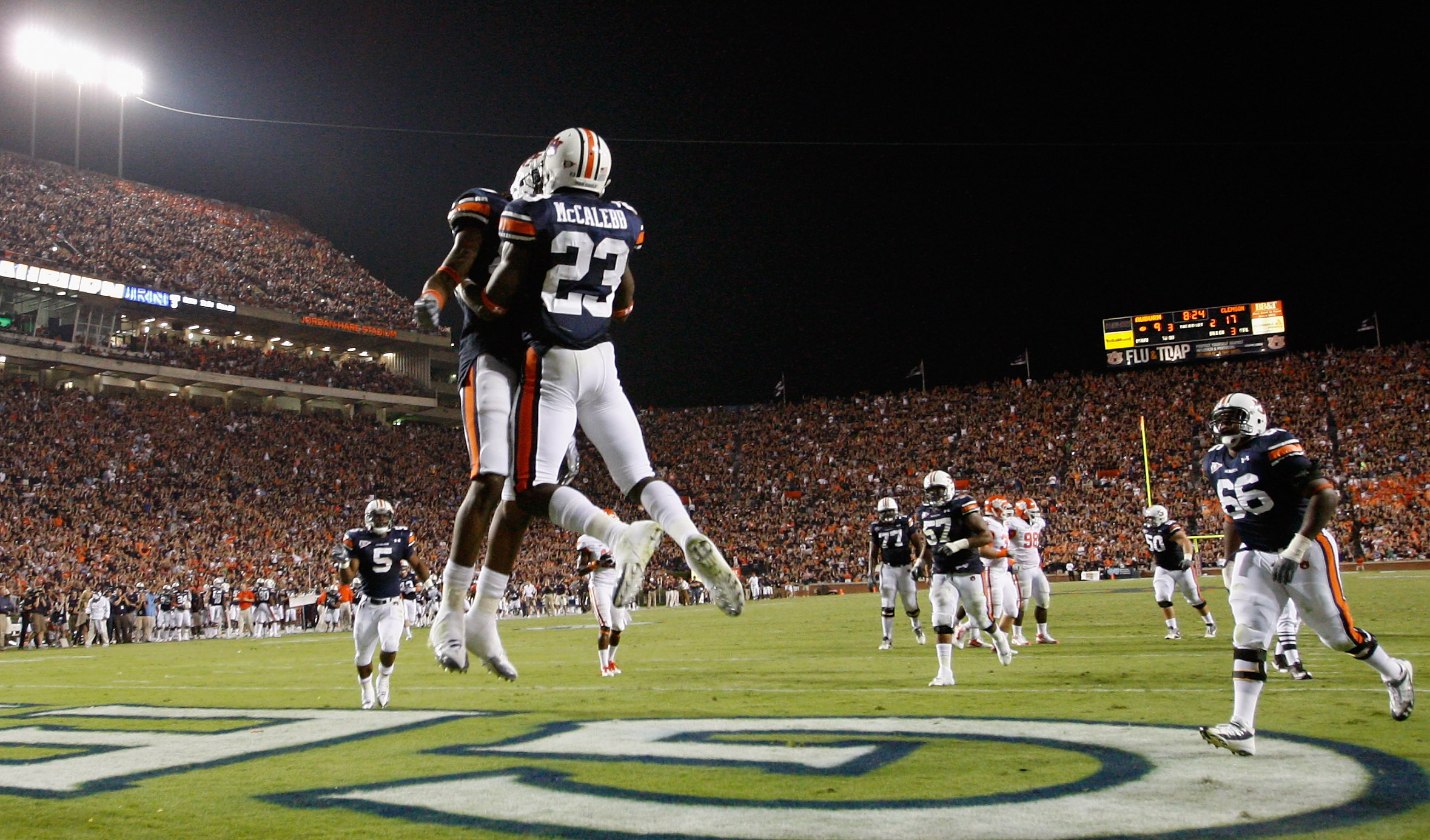 AUBURN, AL - SEPTEMBER 18: Onterio McCalebb #23 of the Auburn Tigers celebrates his touchdown against the Clemson Tigers with Darvin Adams #89 at Jordan-Hare Stadium on September 18, 2010 in Auburn, Alabama. (Photo by Kevin C. Cox/Getty Images) AUBURN, AL - SEPTEMBER 18: Onterio McCalebb #23 of the Auburn Tigers celebrates his touchdown against the Clemson Tigers with Darvin Adams #89 at Jordan-Hare Stadium on September 18, 2010 in Auburn, Alabama. (Photo by Kevin C. Cox/Getty Images)