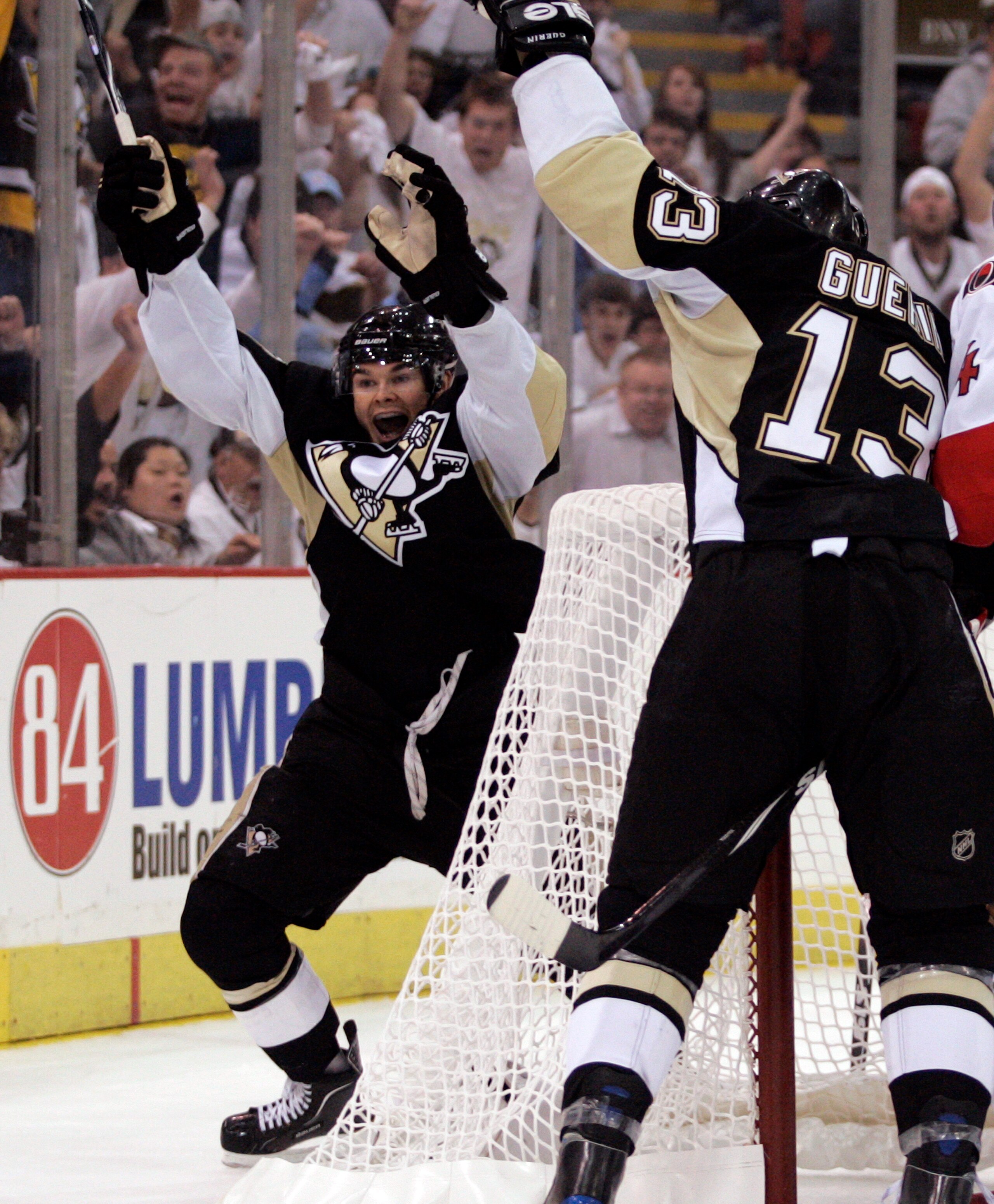 PITTSBURGH - APRIL 22: Chris Kunitz #14 of the Pittsburgh Penguins celebrates his goal late in the second period against the Ottawa Senators in Game Five of the Eastern Conference Quarterfinals during the 2010 NHL Stanley Cup Playoffs at Mellon Arena on PITTSBURGH - APRIL 22: Chris Kunitz #14 of the Pittsburgh Penguins celebrates his goal late in the second period against the Ottawa Senators in Game Five of the Eastern Conference Quarterfinals during the 2010 NHL Stanley Cup Playoffs at Mellon Arena on
