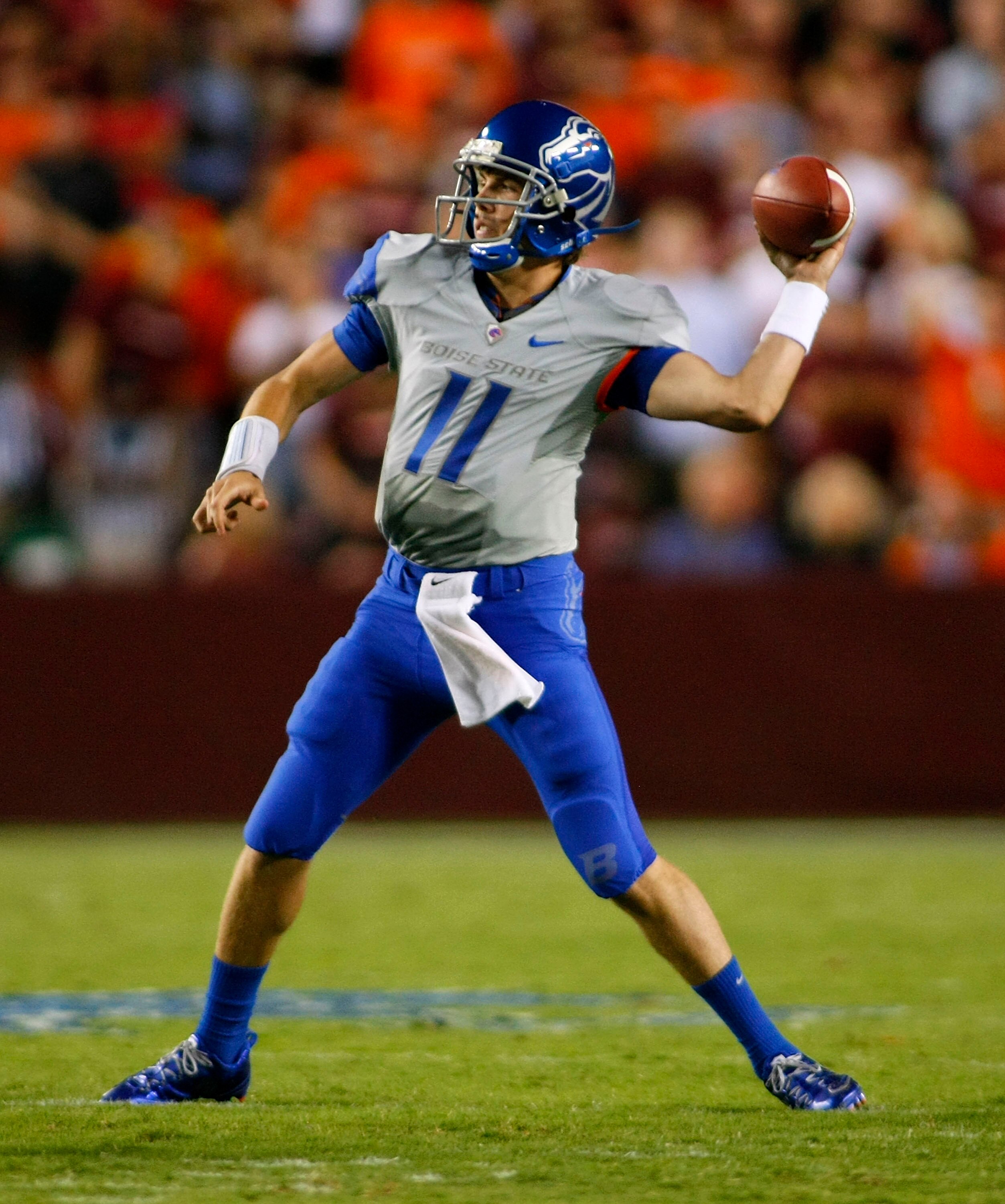 LANDOVER, MD - SEPTEMBER 06:  Quarterback Kellen Moore #11 of the Boise State Broncos passes against the Virginia Tech Hokies at FedExField on September 6, 2010 in Landover, Maryland.  (Photo by Geoff Burke/Getty Images)