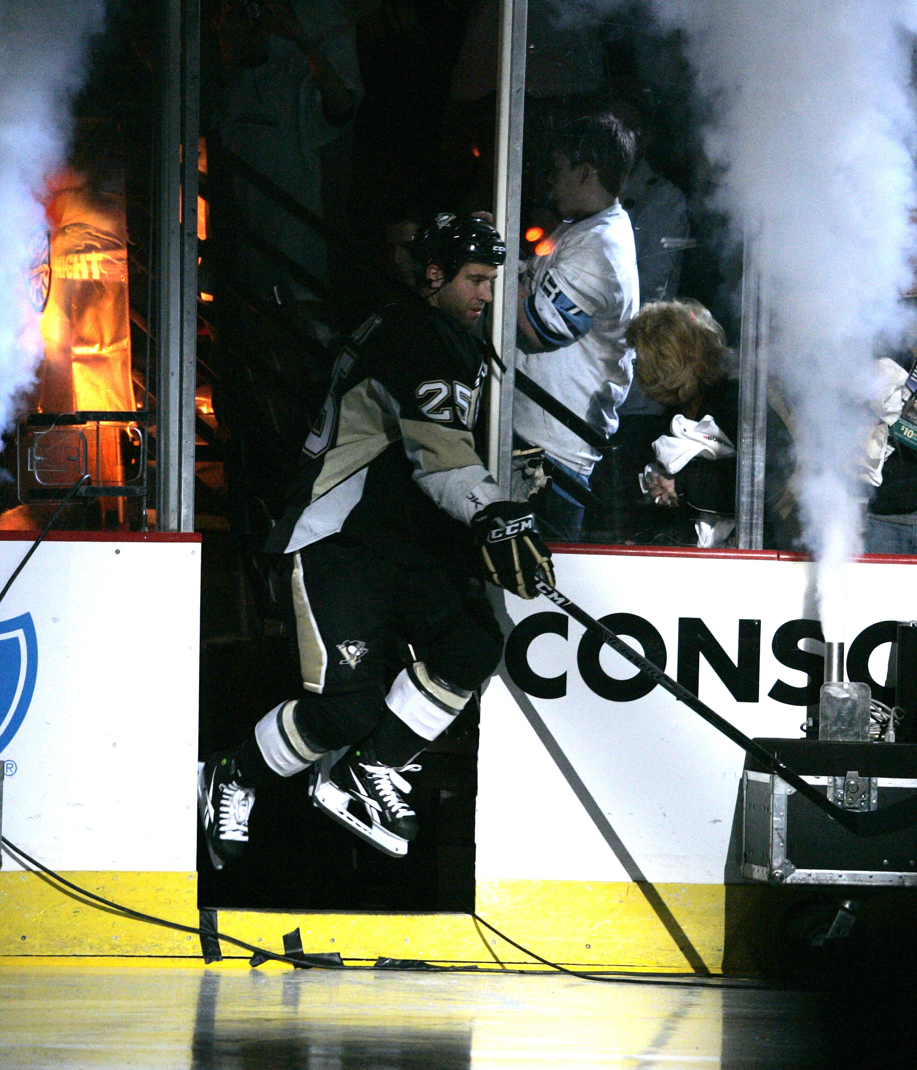 PITTSBURGH - APRIL 16:  Maxime Talbot #25 of the Pittsburgh Penguins jumps onto the ice before the start of play against the Ottawa Senators n Game Two of the Eastern Conference Quarterfinals during the 2010 NHL Stanley Cup Playoffs at Mellon Arena on Apr