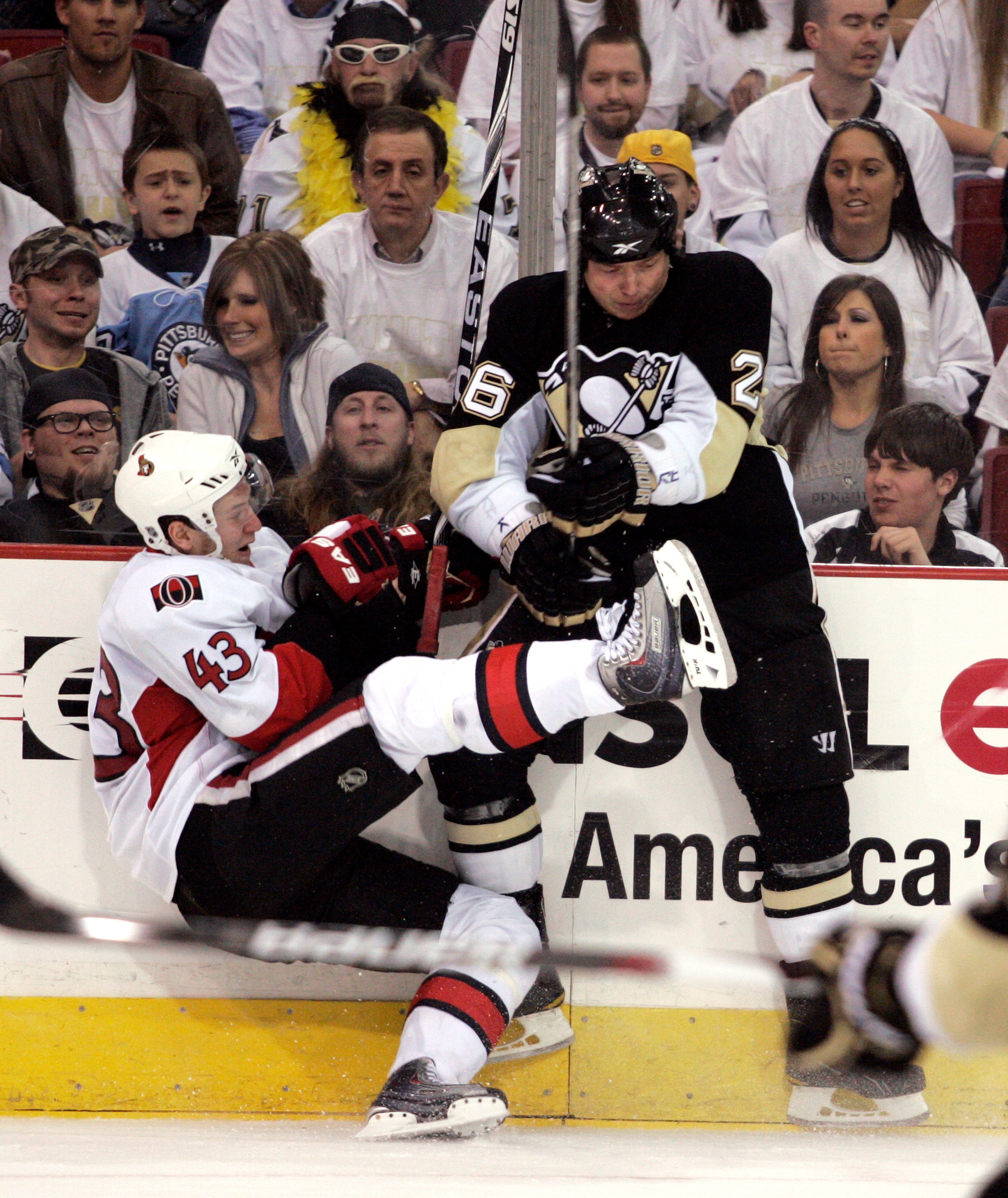 PITTSBURGH - APRIL 22: Ruslan Fedotenko #26 of the Pittsburgh Penguins hits Peter Regin #43 of the Ottawa Senators in Game Five of the Eastern Conference Quarterfinals during the 2010 NHL Stanley Cup Playoffs at Mellon Arena on April 22, 2010 in Pittsbur PITTSBURGH - APRIL 22: Ruslan Fedotenko #26 of the Pittsburgh Penguins hits Peter Regin #43 of the Ottawa Senators in Game Five of the Eastern Conference Quarterfinals during the 2010 NHL Stanley Cup Playoffs at Mellon Arena on April 22, 2010 in Pittsbur