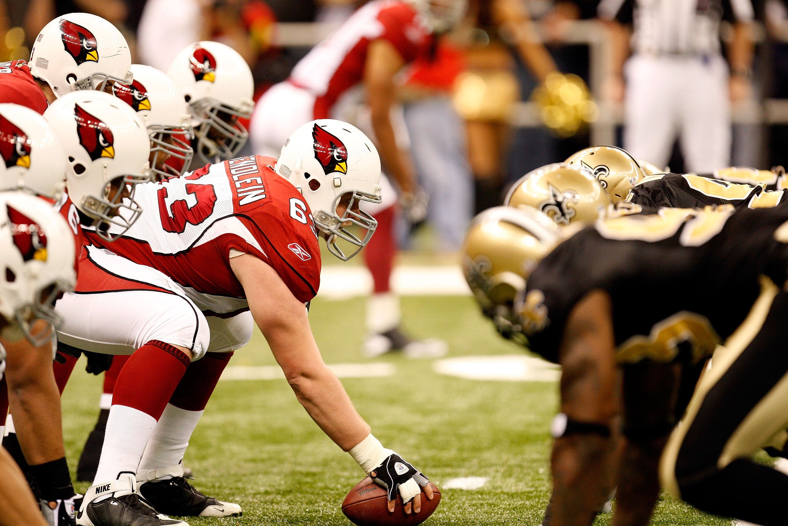 NEW ORLEANS - JANUARY 16:  Center Lyle Sendlein #63 of the Arizona Cardinals centers the ball at the line of scrimmage against the New Orleans Saints during the NFC Divisional Playoff Game at Louisana Superdome on January 16, 2010 in New Orleans, Louisian