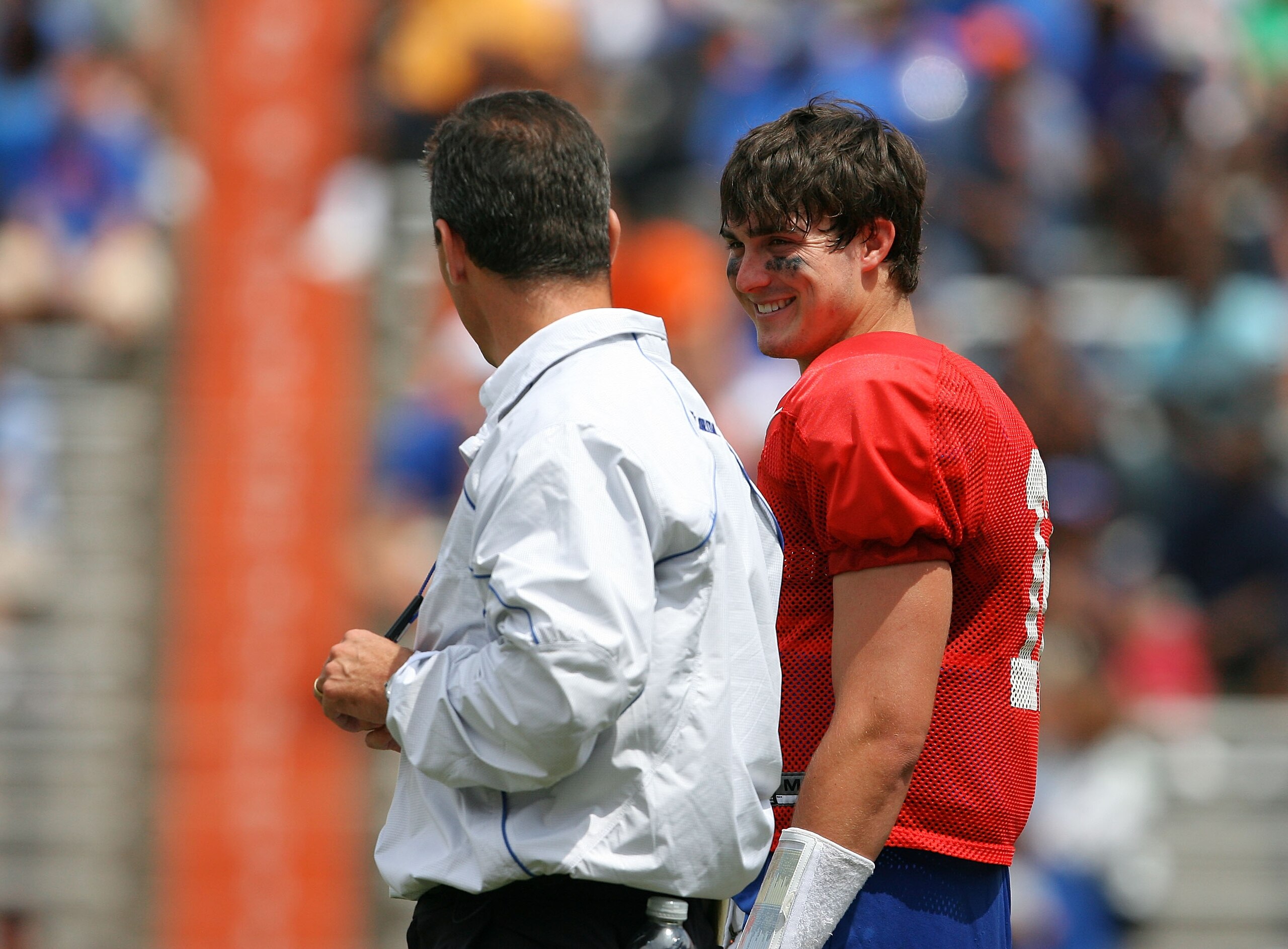 GAINESVILLE, FL - APRIL 10:  Head coach Urban Meyer of the Florida Gators shares a laugh with quarterback John Brantley #12 during the Orange & Blue game at Ben Hill Griffin Stadium on April 10, 2010 in Gainesville, Florida.  (Photo by Doug Benc/Getty Ima