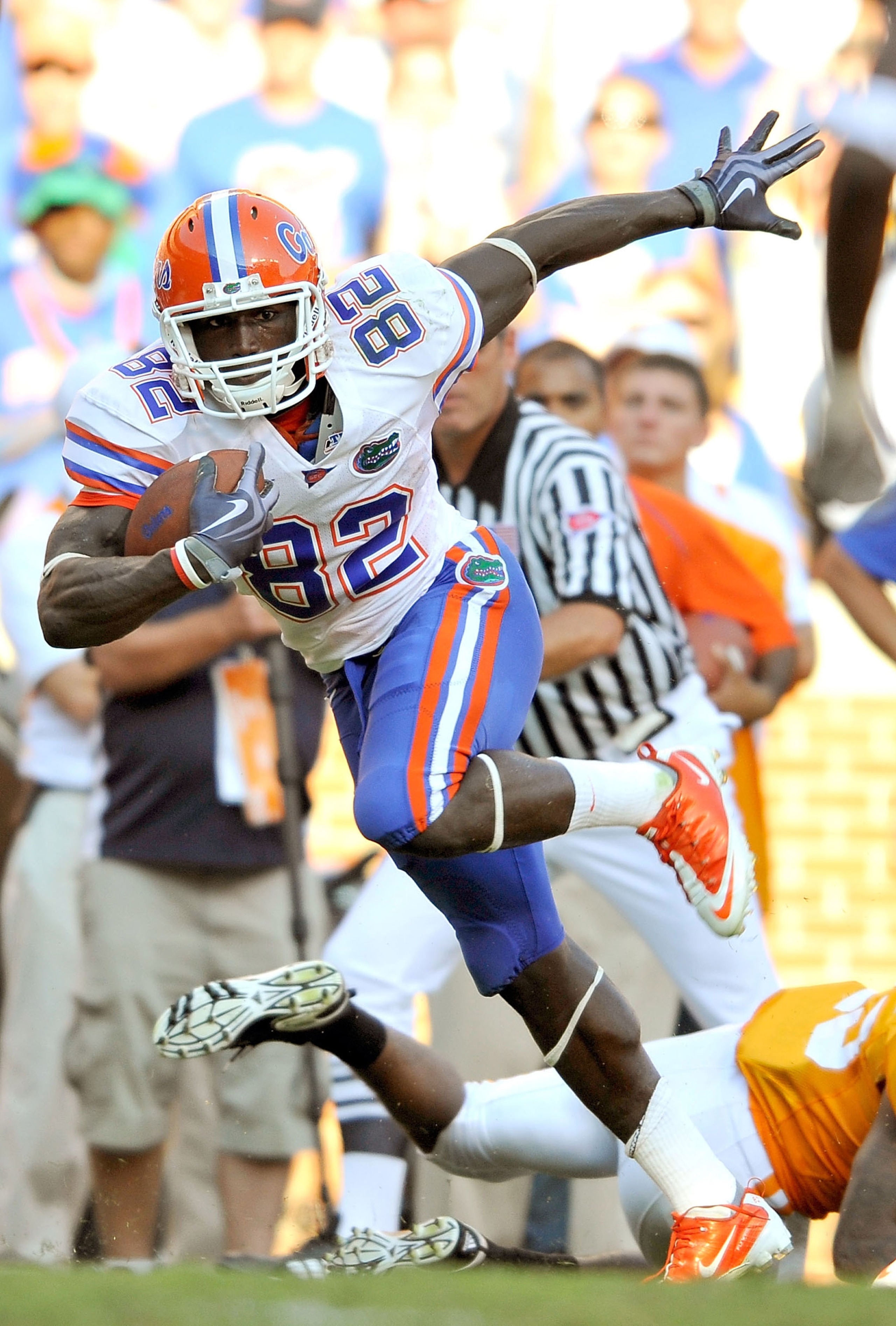 KNOXVILLE, TN - SEPTEMBER 18:  Omarius Hines #82 of the Florida Gators fights for extra yardage against the Tennessee Volunteers at Neyland Stadium on September 18, 2010 in Knoxville, Tennessee. Florida won 31-17.  (Photo by Grant Halverson/Getty Images)