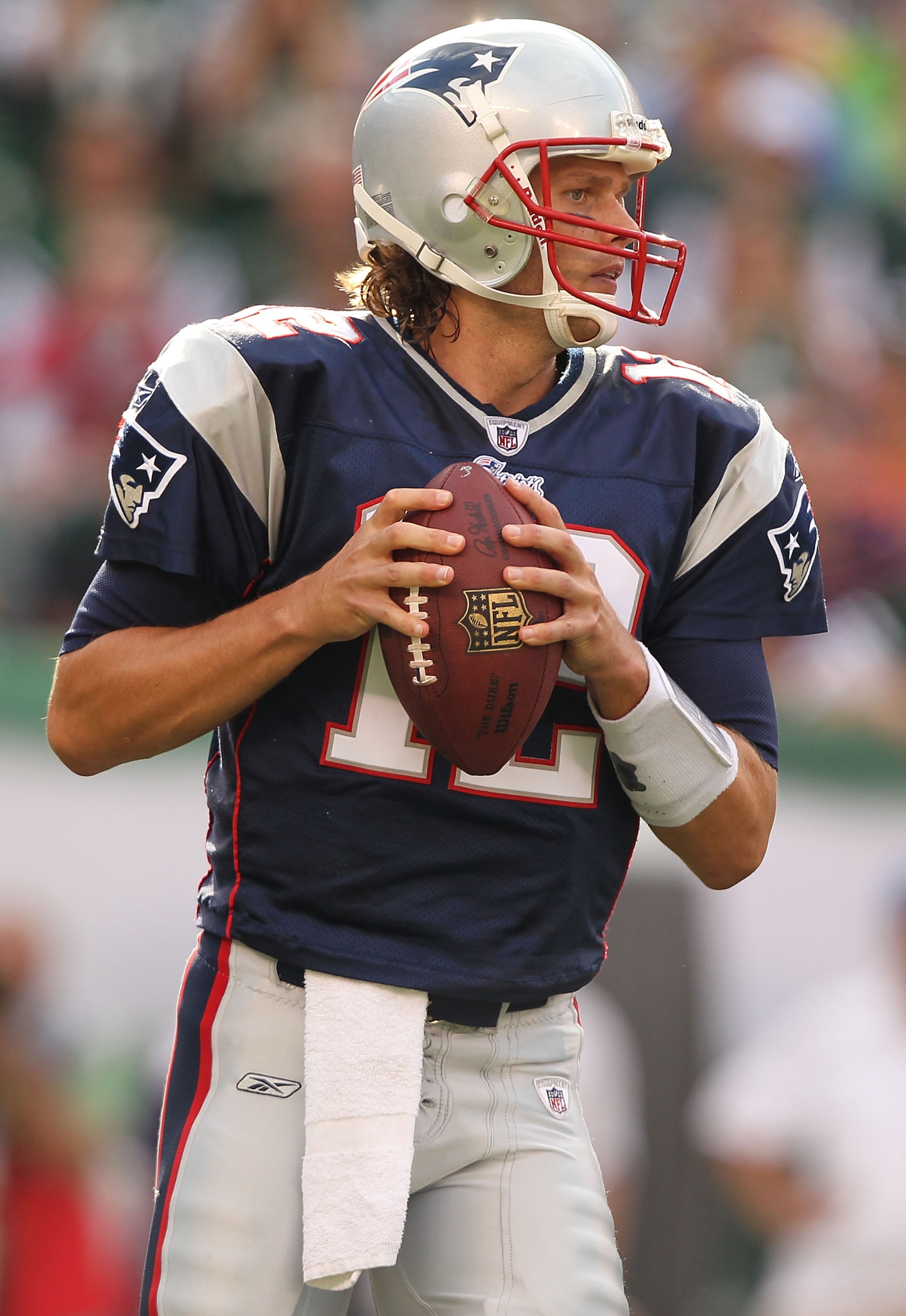 EAST RUTHERFORD, NJ - SEPTEMBER 19:  Tom Brady #12 of the New England Patriots in action against the New York Jets during their  game on September 19, 2010 at the New Meadowlands Stadium  in East Rutherford, New Jersey.  (Photo by Al Bello/Getty Images)