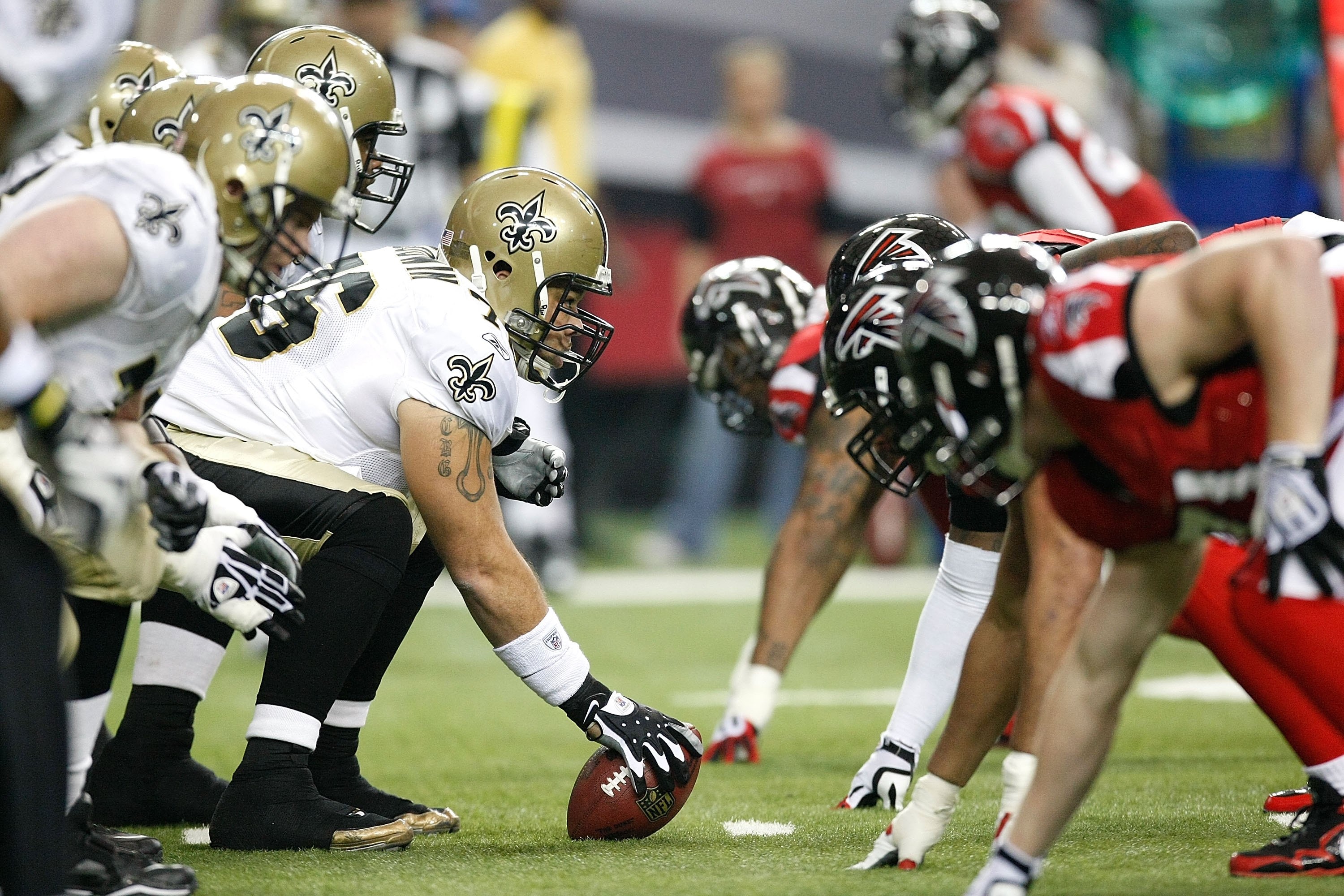 ATLANTA - DECEMBER 13:  The offense of the New Orleans Saints against the defense of the Atlanta Falcons at Georgia Dome on December 13, 2009 in Atlanta, Georgia.  (Photo by Kevin C. Cox/Getty Images)