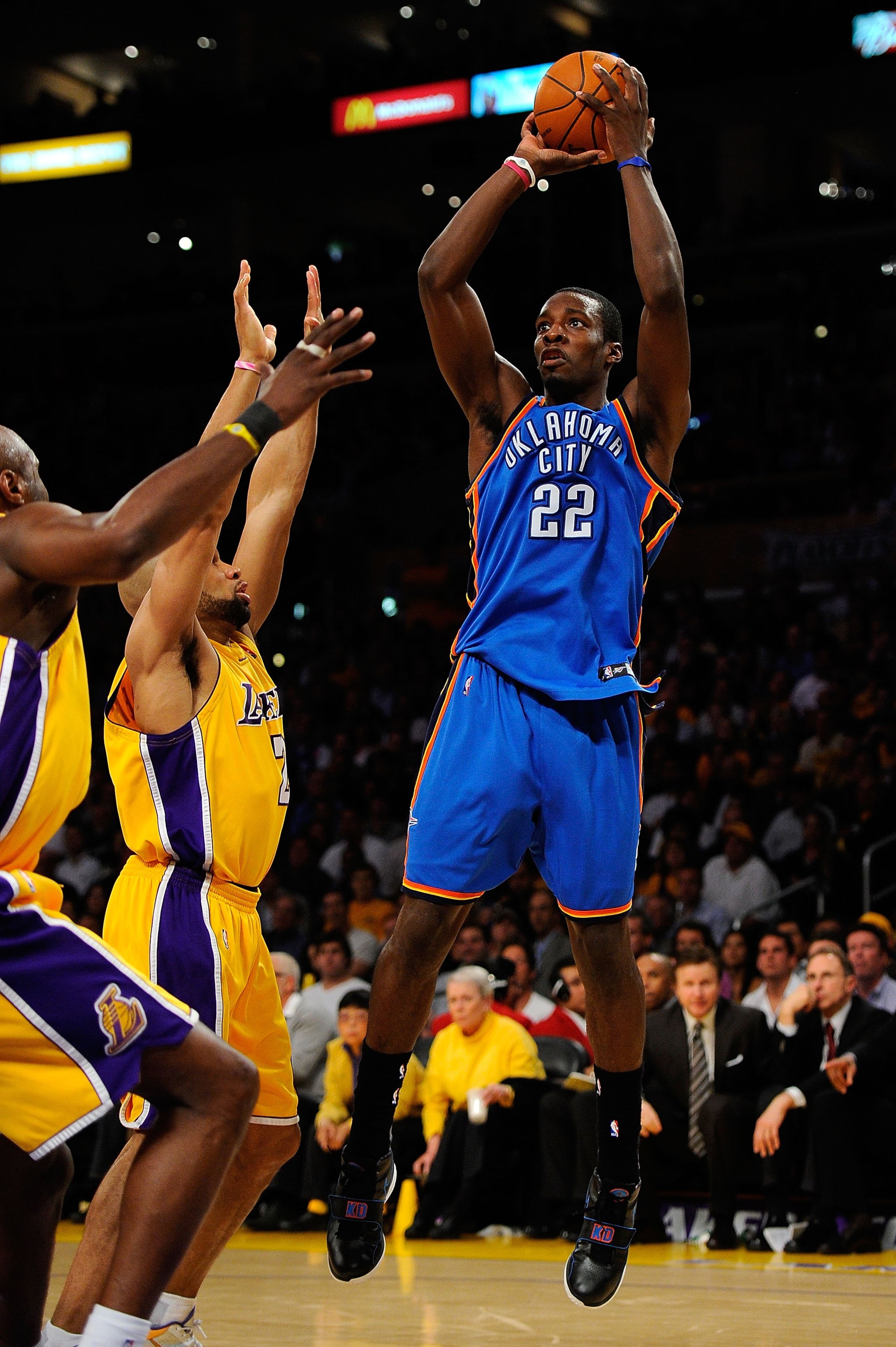 LOS ANGELES, CA - APRIL 27:  Jeff Green #22 of the Oklahoma City Thunder shoots over Derek Fisher #2 of the Los Angeles Lakers during Game Five of the Western Conference Quarterfinals of the 2010 NBA Playoffs at Staples Center on April 27, 2010 in Los Ang