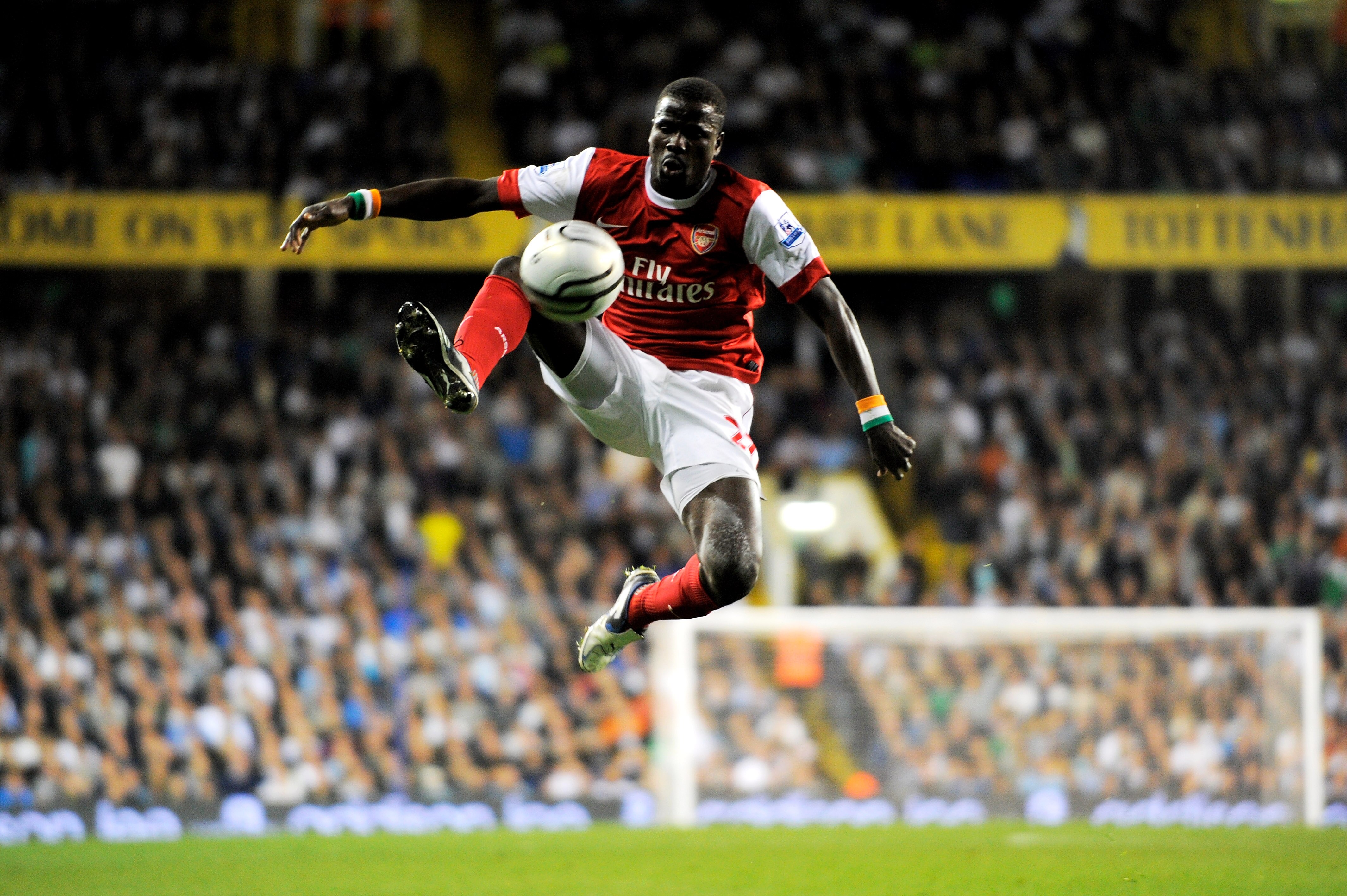 LONDON, ENGLAND - SEPTEMBER 21:  Emmanuel Eboue of Arsenal controls the ball during the Carling Cup third round match between Tottenham Hotspur and Arsenal at White Hart Lane on September 21, 2010 in London, England.  (Photo by Michael Regan/Getty Images)