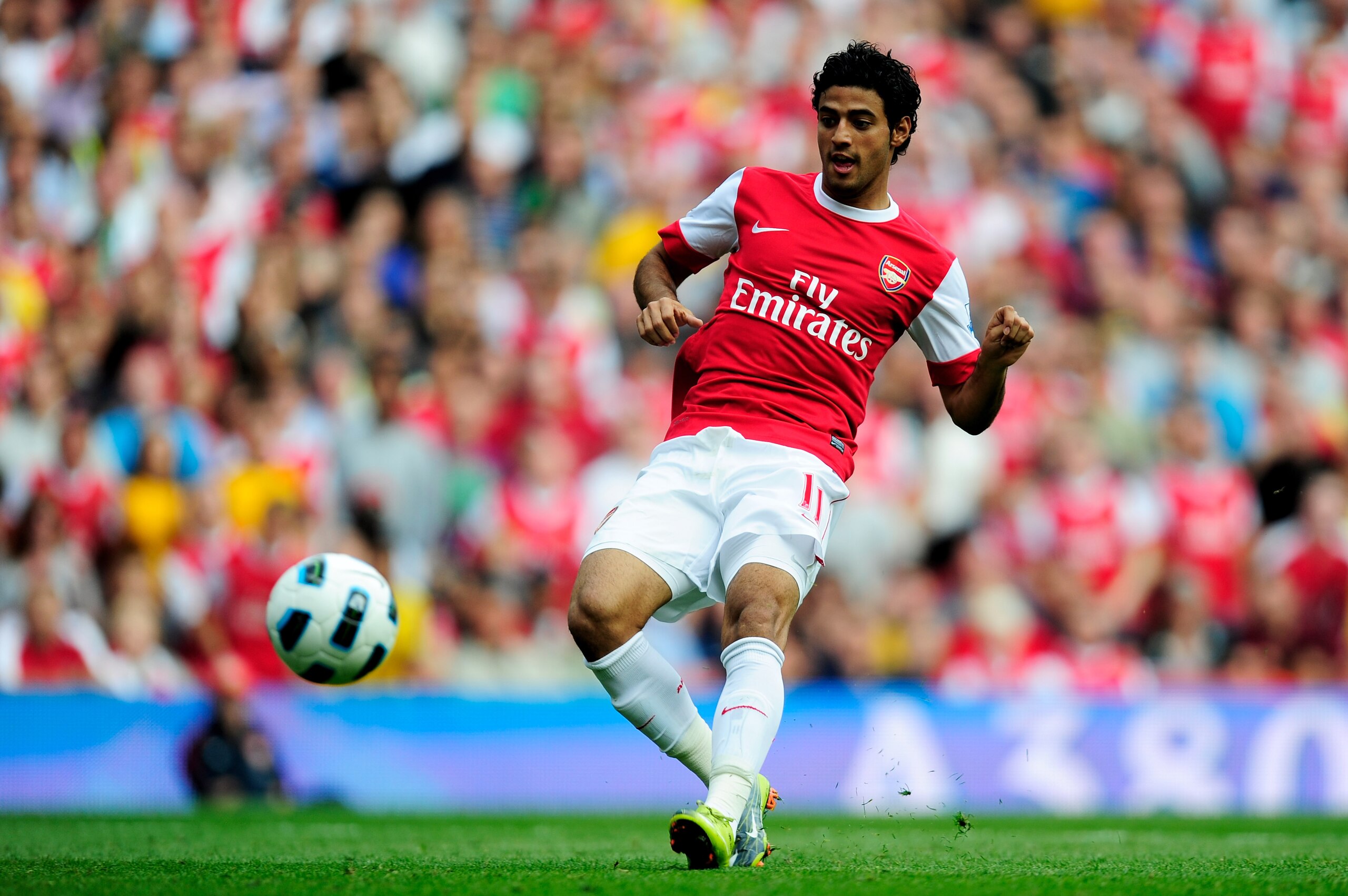 LONDON, ENGLAND - SEPTEMBER 11:  Carlos Vela of Arsenal scores his teams fourth goal during the Barclays Premier League match between Arsenal and Bolton Wanderers at The Emirates Stadium on September 11, 2010 in London, England.  (Photo by Jamie McDonald/