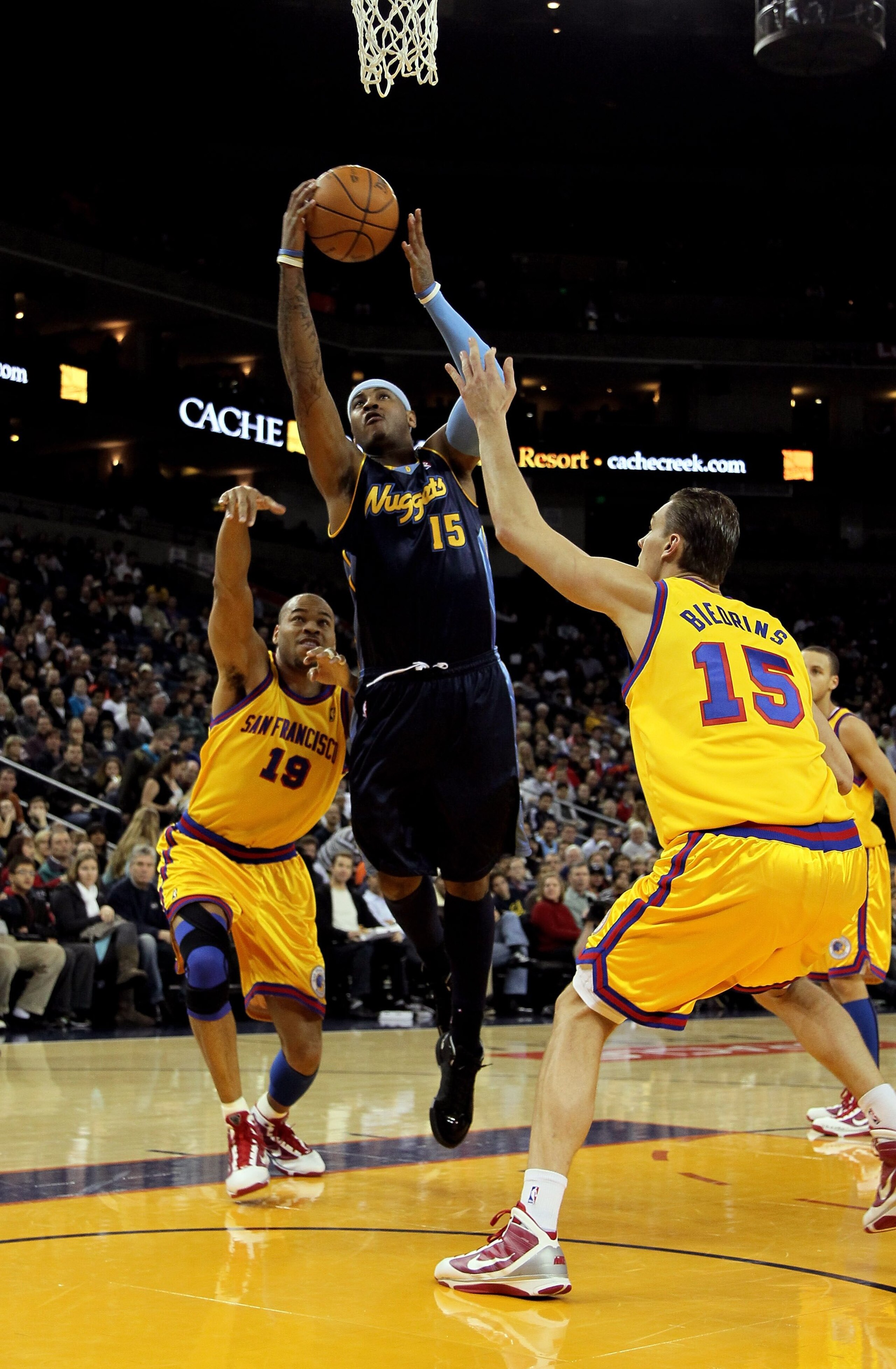 OAKLAND, CA - JANUARY 20: Carmelo Anthony #15 of the Denver Nuggets in action during their game against the Golden State Warriors at Oracle Arena on January 20, 2010 in Oakland, California. NOTE TO USER: User expressly acknowledges and agrees that, by d OAKLAND, CA - JANUARY 20: Carmelo Anthony #15 of the Denver Nuggets in action during their game against the Golden State Warriors at Oracle Arena on January 20, 2010 in Oakland, California. NOTE TO USER: User expressly acknowledges and agrees that, by d