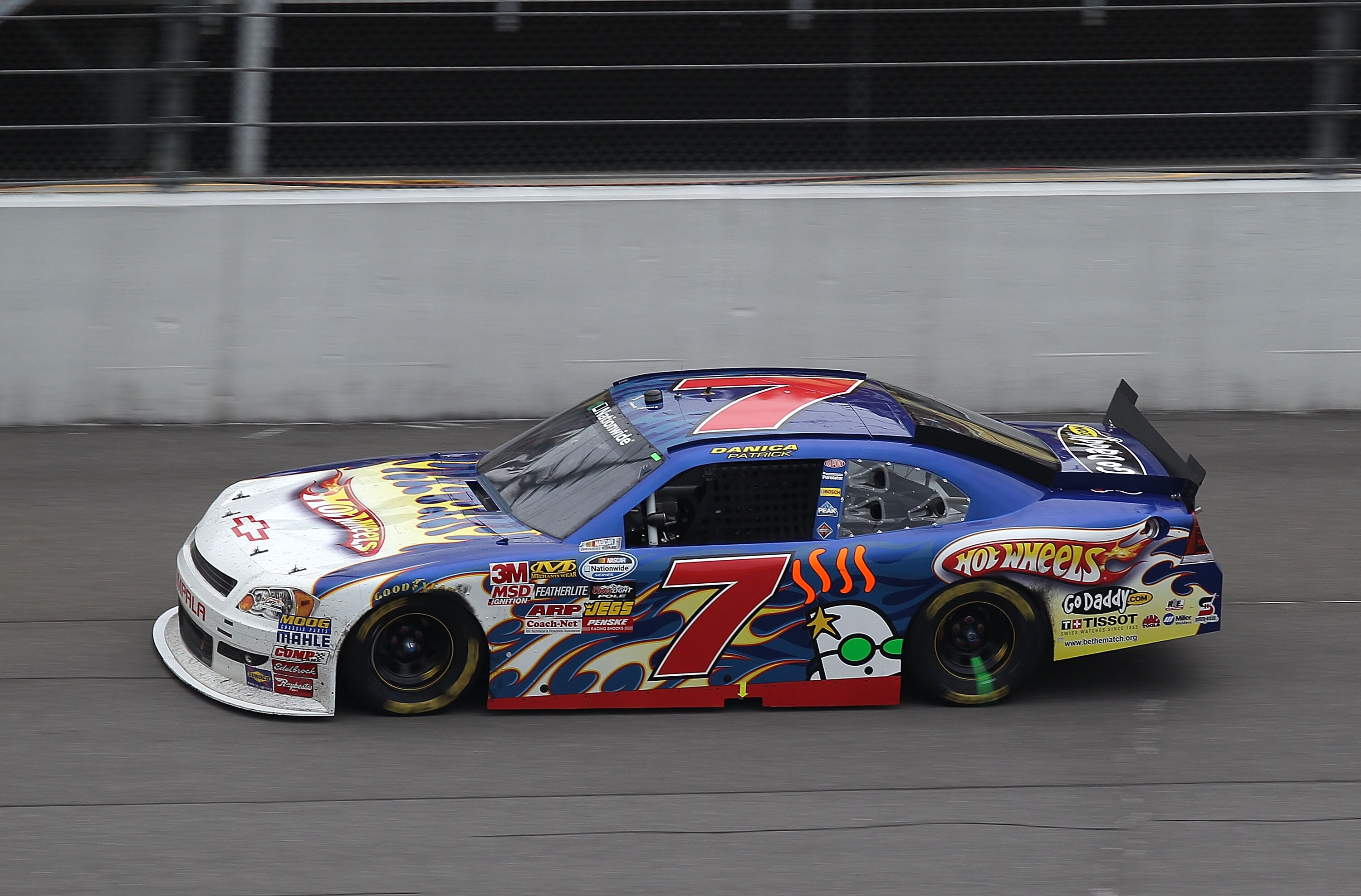 BROOKLYN, MI - AUGUST 14:  Danica Patrick, driver of the #7 Hot Whgeels/GoDaddy.com Chevrolet, drives during the NASCAR Nationwide Series CARFAX 250 at Michigan International Speedway on August 14, 2010 in Brooklyn, Michigan.  (Photo by Jonathan Daniel/Ge