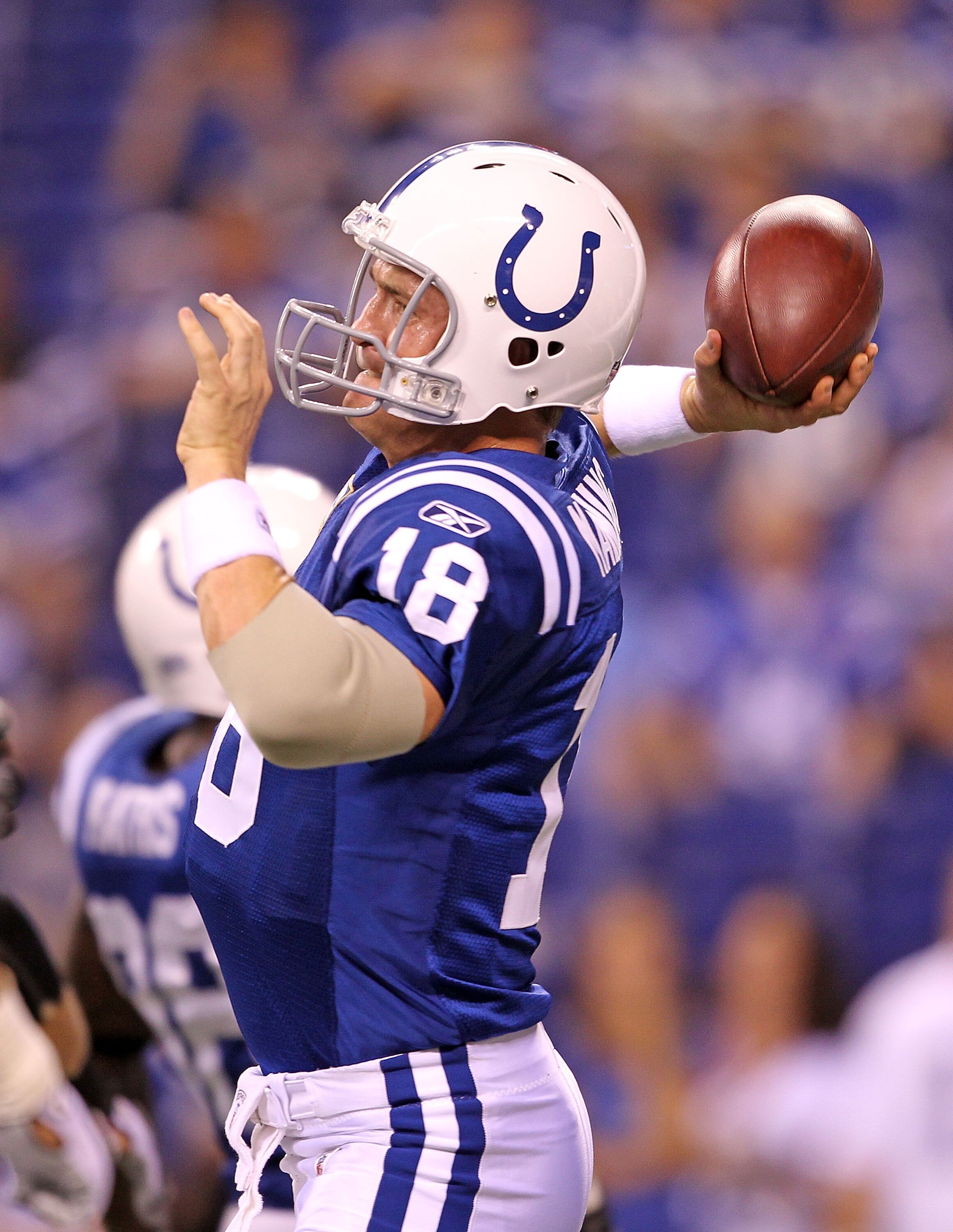 INDIANAPOLIS - SEPTEMBER 19:  Peyton Manning #18 of the Indianapolis Colts throws a pass during  warmups before the NFL game against the New York Giants  at Lucas Oil Stadium on September 19, 2010 in Indianapolis, Indiana.  (Photo by Andy Lyons/Getty Imag