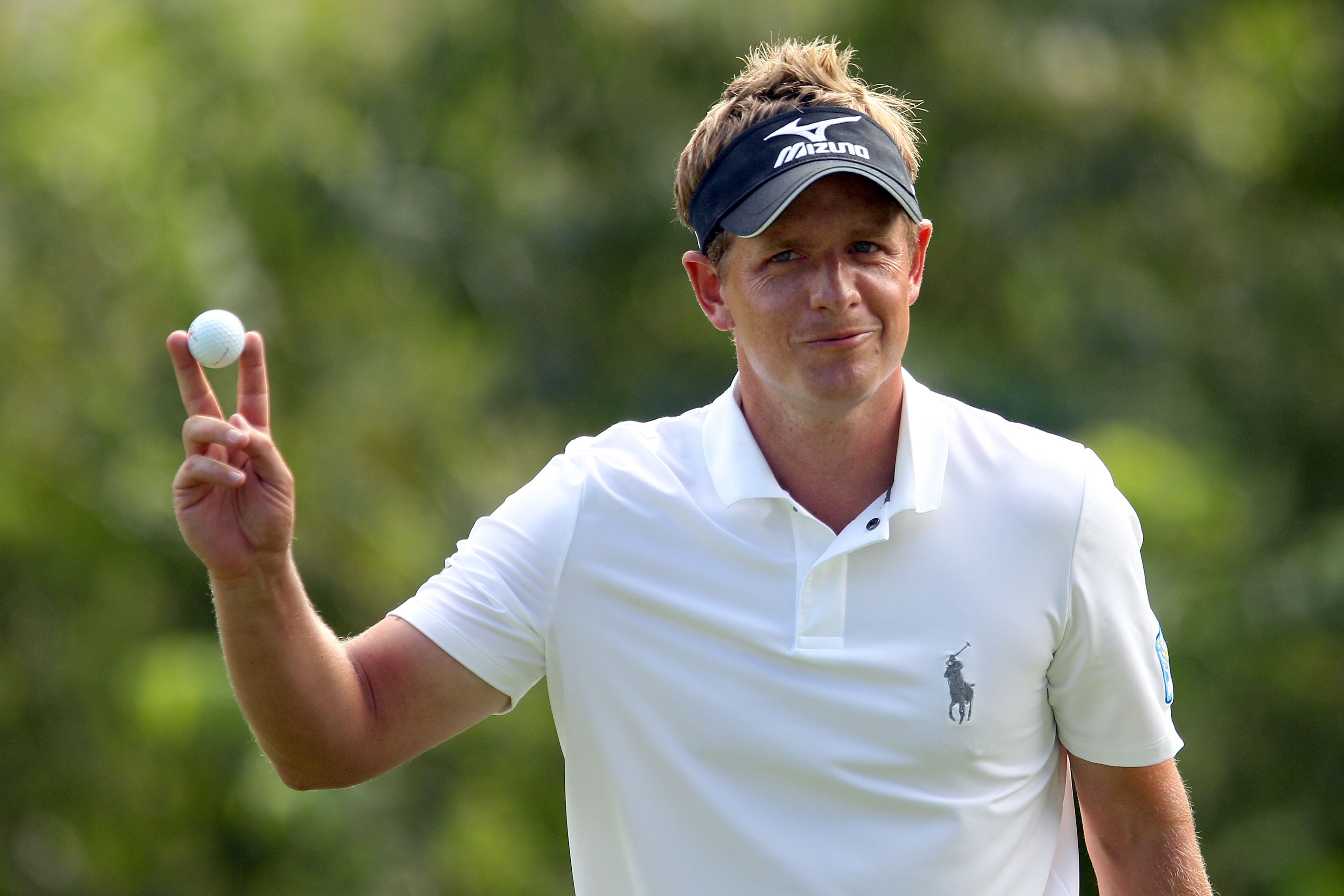 LEMONT, IL - SEPTEMBER 10:  Luke Donald of England waves to the gallery on the 16th green during the second round of the BMW Championship at Cog Hill Golf & Country Club on September 10, 2010 in Lemont, Illinois.  (Photo by Scott Halleran/Getty Images)