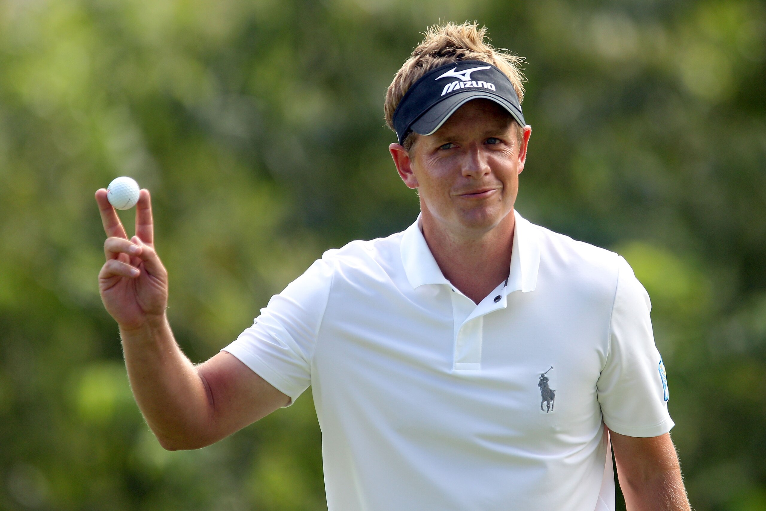 LEMONT, IL - SEPTEMBER 10:  Luke Donald of England waves to the gallery on the 16th green during the second round of the BMW Championship at Cog Hill Golf & Country Club on September 10, 2010 in Lemont, Illinois.  (Photo by Scott Halleran/Getty Images)