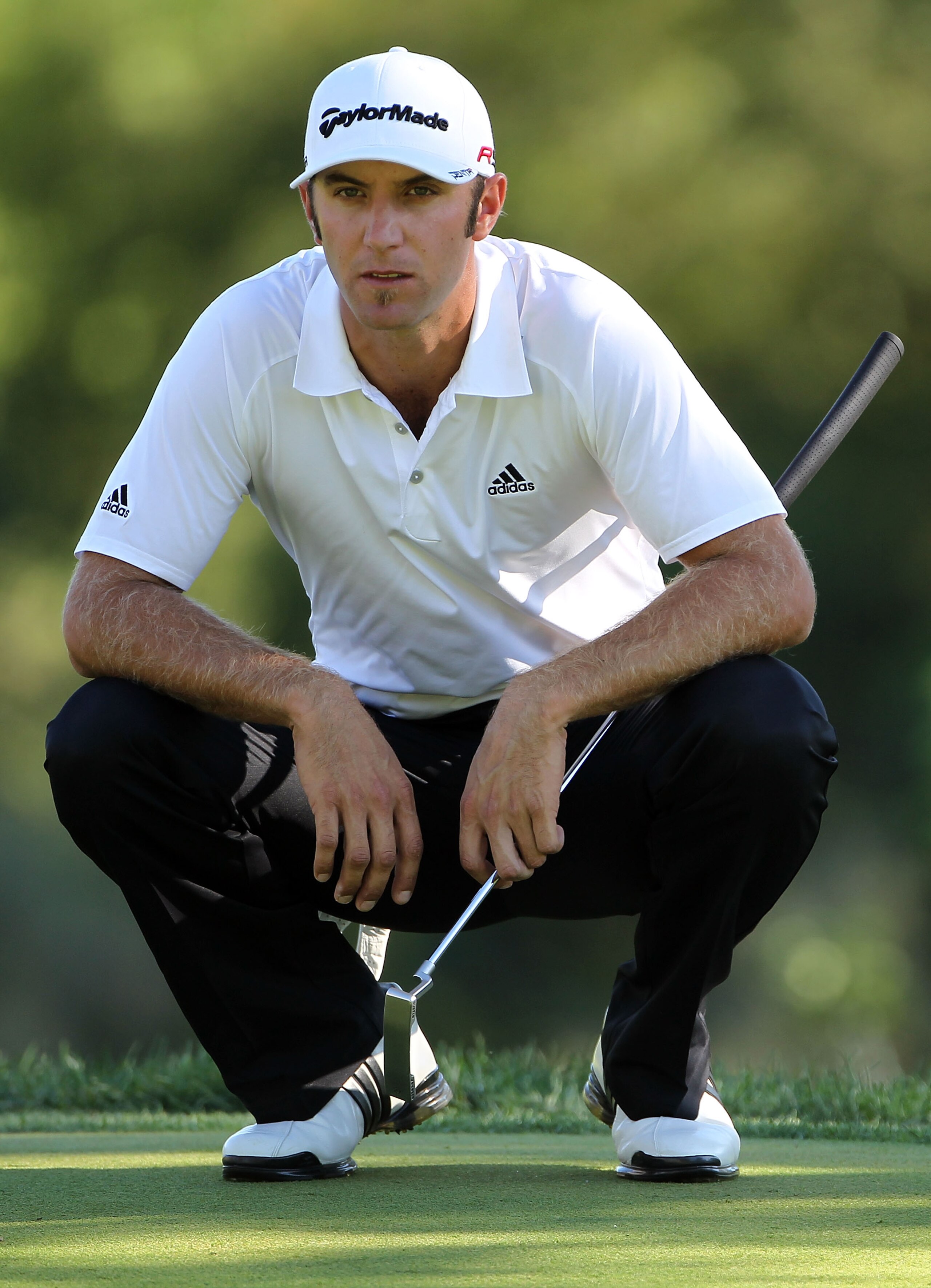 LEMONT, IL - SEPTEMBER 12:  Dustin Johnson waits on the 16th green during the final round of the BMW Championship at Cog Hill Golf & Country Club on September 12, 2010 in Lemont, Illinois.  (Photo by Jamie Squire/Getty Images)