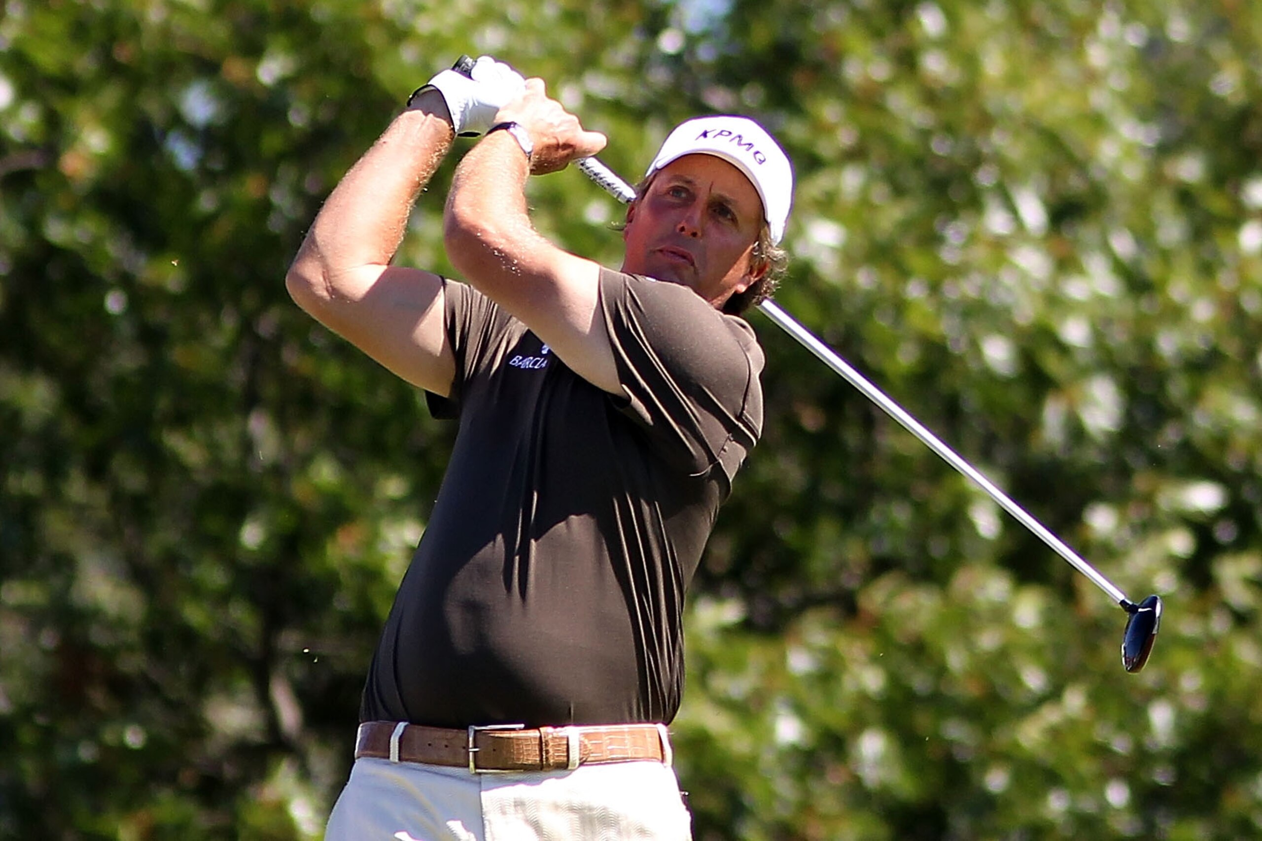 LEMONT, IL - SEPTEMBER 12:  Phil Mickelson tees off on the fourth hole during the final round of the BMW Championship at Cog Hill Golf & Country Club on September 12, 2010 in Lemont, Illinois.  (Photo by Maxx Wolfson/Getty Images)