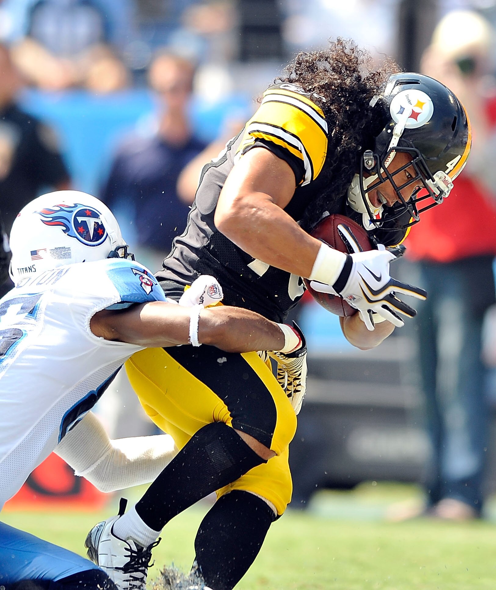 NASHVILLE, TN - SEPTEMBER 19: Troy Polamalu #43 of the Pittsburgh Steelers intercepts a pass in the end zone intended for Nate Washington #85 of the Tennessee Titans during the first half at LP Field on September 19, 2010 in Nashville, Tennessee. (Phot NASHVILLE, TN - SEPTEMBER 19: Troy Polamalu #43 of the Pittsburgh Steelers intercepts a pass in the end zone intended for Nate Washington #85 of the Tennessee Titans during the first half at LP Field on September 19, 2010 in Nashville, Tennessee. (Phot