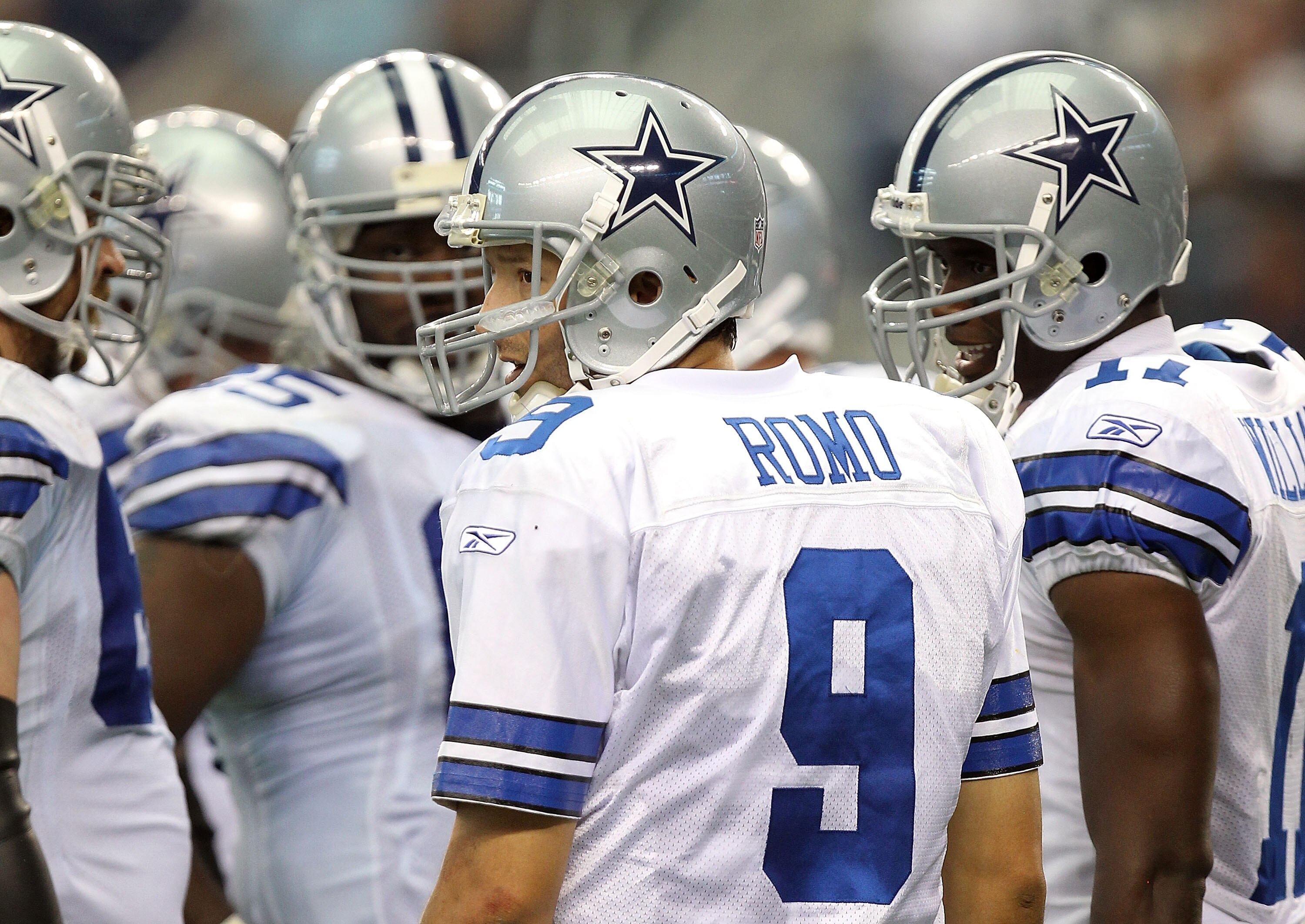 ARLINGTON, TX - SEPTEMBER 19: Quarterback Tony Romo #9 of the Dallas Cowboys at Cowboys Stadium on September 19, 2010 in Arlington, Texas. (Photo by Ronald Martinez/Getty Images) ARLINGTON, TX - SEPTEMBER 19: Quarterback Tony Romo #9 of the Dallas Cowboys at Cowboys Stadium on September 19, 2010 in Arlington, Texas. (Photo by Ronald Martinez/Getty Images)