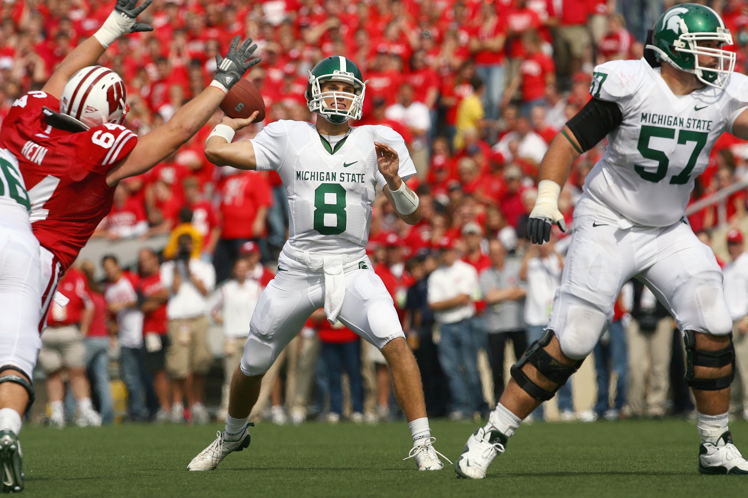 MADISON, WI - SEPTEMBER 26: Kirk Cousins #8 of the Michigan State Spartans looks to pass the ball against the Wisconsin Badgers on September 26, 2009 at Camp Randall Stadium in Madison, Wisconsin. (Photo by Jonathan Daniel/Getty Images)