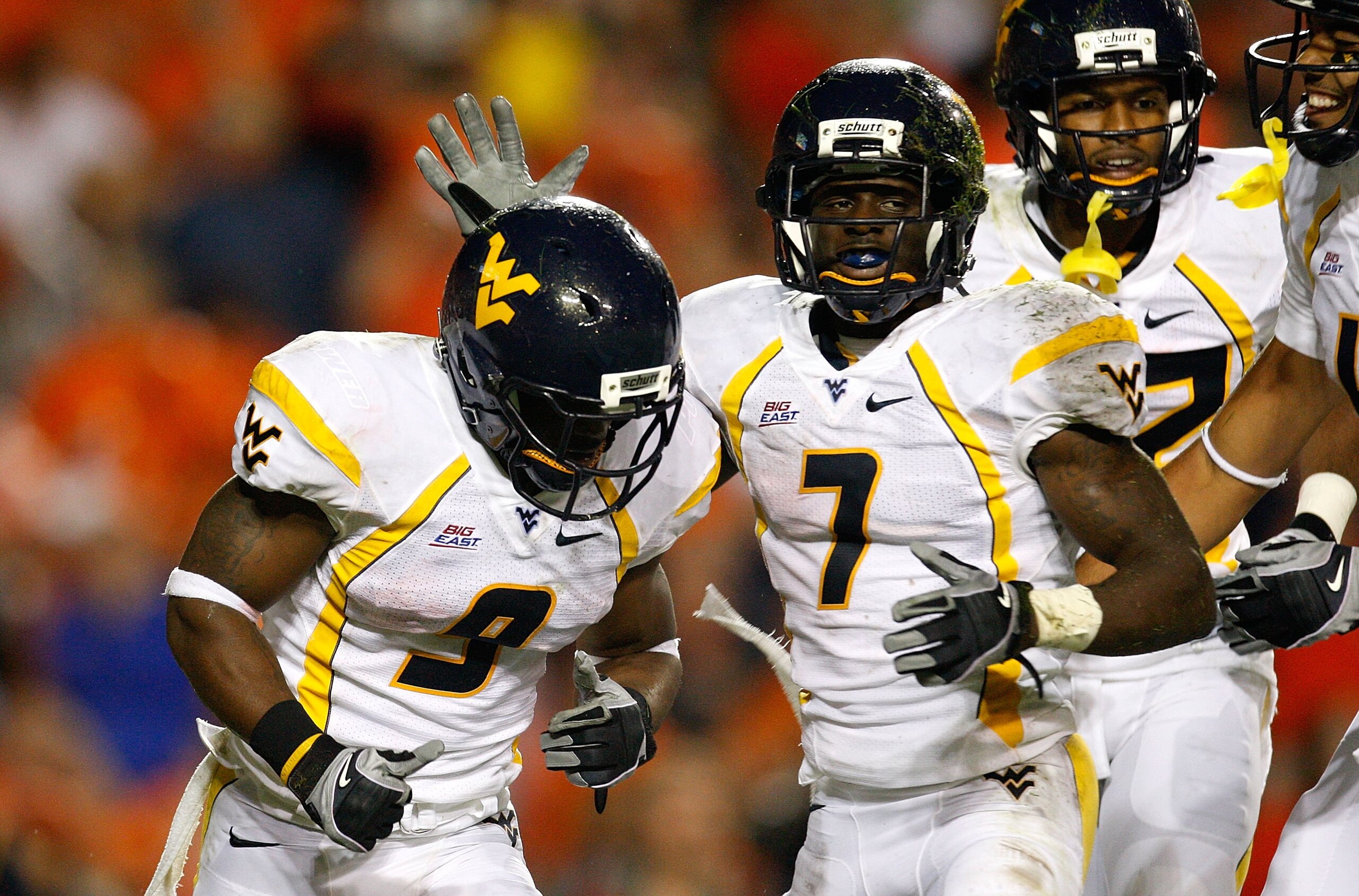 AUBURN, AL - SEPTEMBER 19:  Jock Sanders #9 and Noel Devine #7 of the West Virginia Mountaineers against the Auburn Tigers at Jordan-Hare Stadium on September 19, 2009 in Auburn, Alabama.  (Photo by Kevin C. Cox/Getty Images)