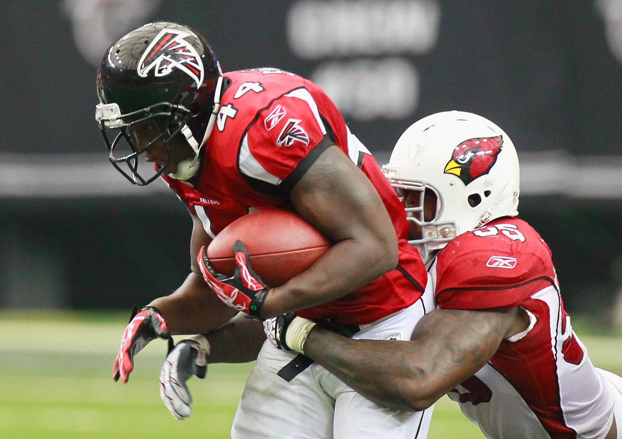 ATLANTA - SEPTEMBER 19:  Jason Snelling #44 of the Atlanta Falcons is tackled by Joey Porter #55 of the Arizona Cardinals at Georgia Dome on September 19, 2010 in Atlanta, Georgia.  (Photo by Kevin C. Cox/Getty Images)