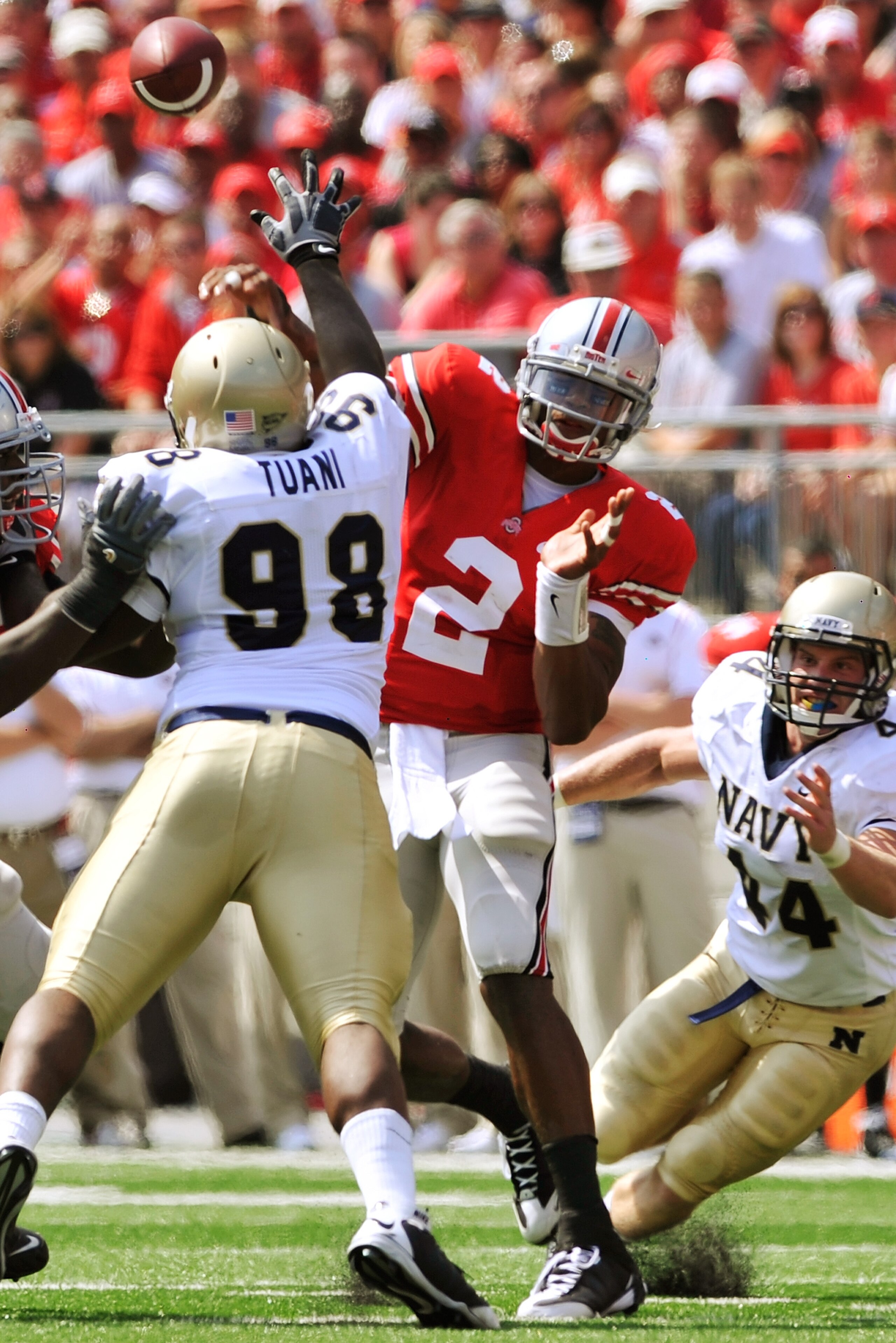 COLUMBUS, OH - SEPTEMBER 05:  Quarterback Terrell Pryor #2 of the Ohio State Buckeyes completes a pass over the defense of Jabaree Tuani #98 of the Navy Midshipmen at Ohio Stadium on September 5, 2009 in Columbus, Ohio.  (Photo by Jamie Sabau/Getty Images