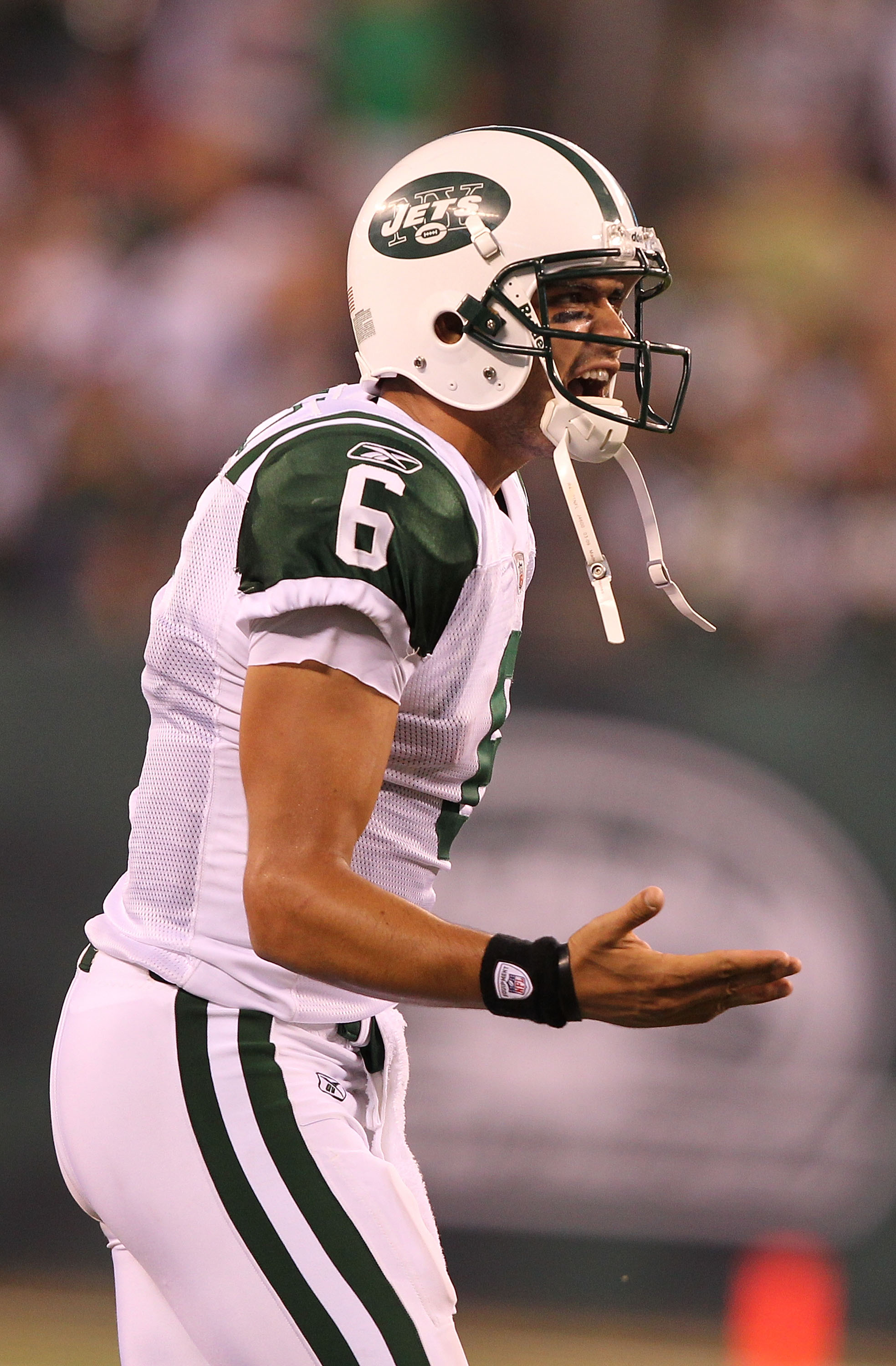EAST RUTHERFORD, NJ - SEPTEMBER 19:  Mark Sanchez #6 of the New York Jets celebrates a touchdown against the New England Patriots during their  game on September 19, 2010 at the New Meadowlands Stadium  in East Rutherford, New Jersey.  (Photo by Al Bello/