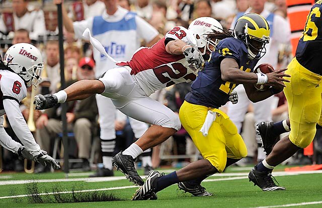 Denard Drags Tackler Into Endzone (detnews.com)