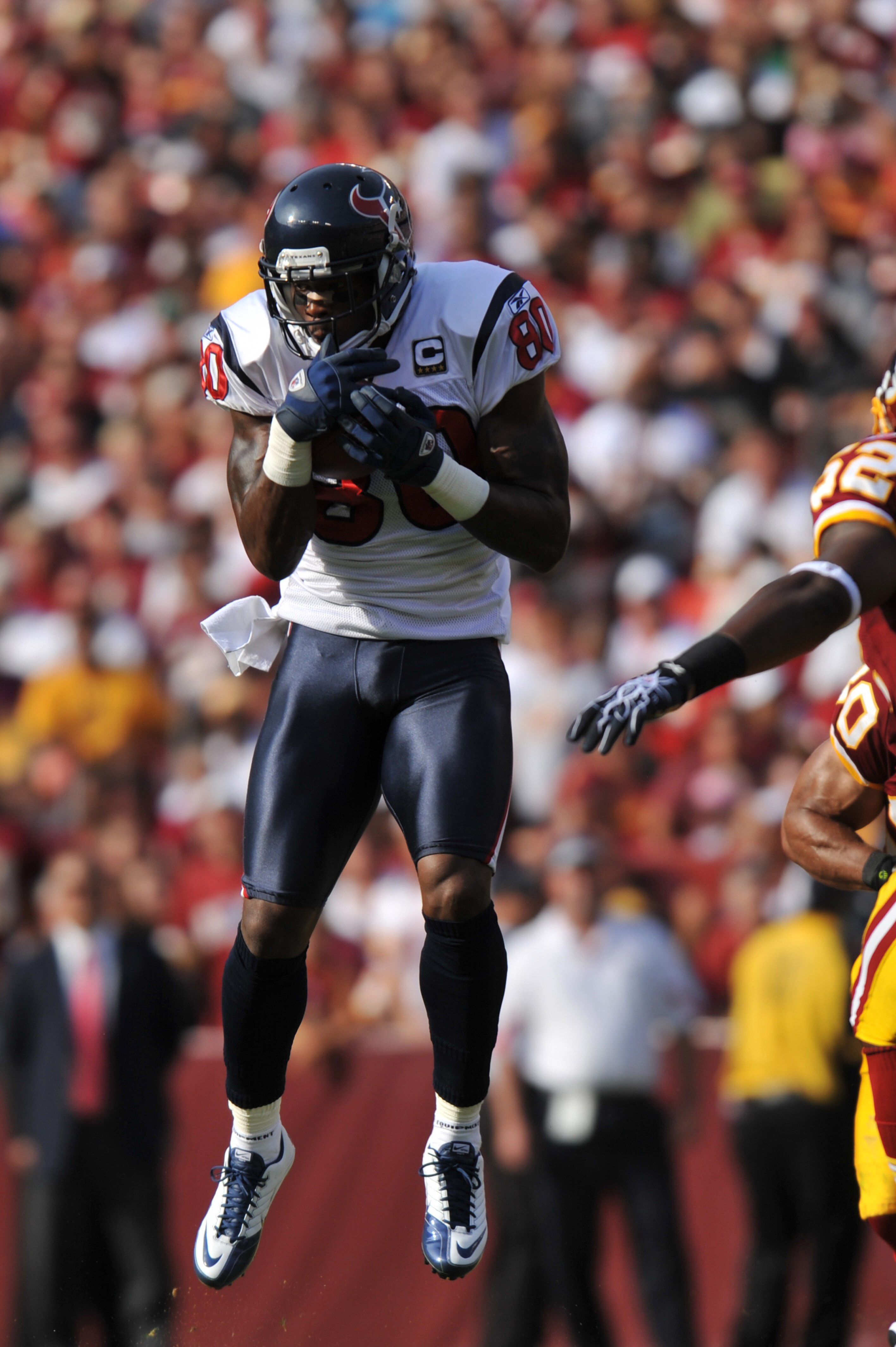 LANDOVER - SEPTEMBER 19:  Andre Johnson #80 of the Houston Texans makes a catch against the Washington Redskins at FedExField on September 19, 2010 in Landover, Maryland. The Texans defeated the Redskins in overtime 30-27. (Photo by Larry French/Getty Ima